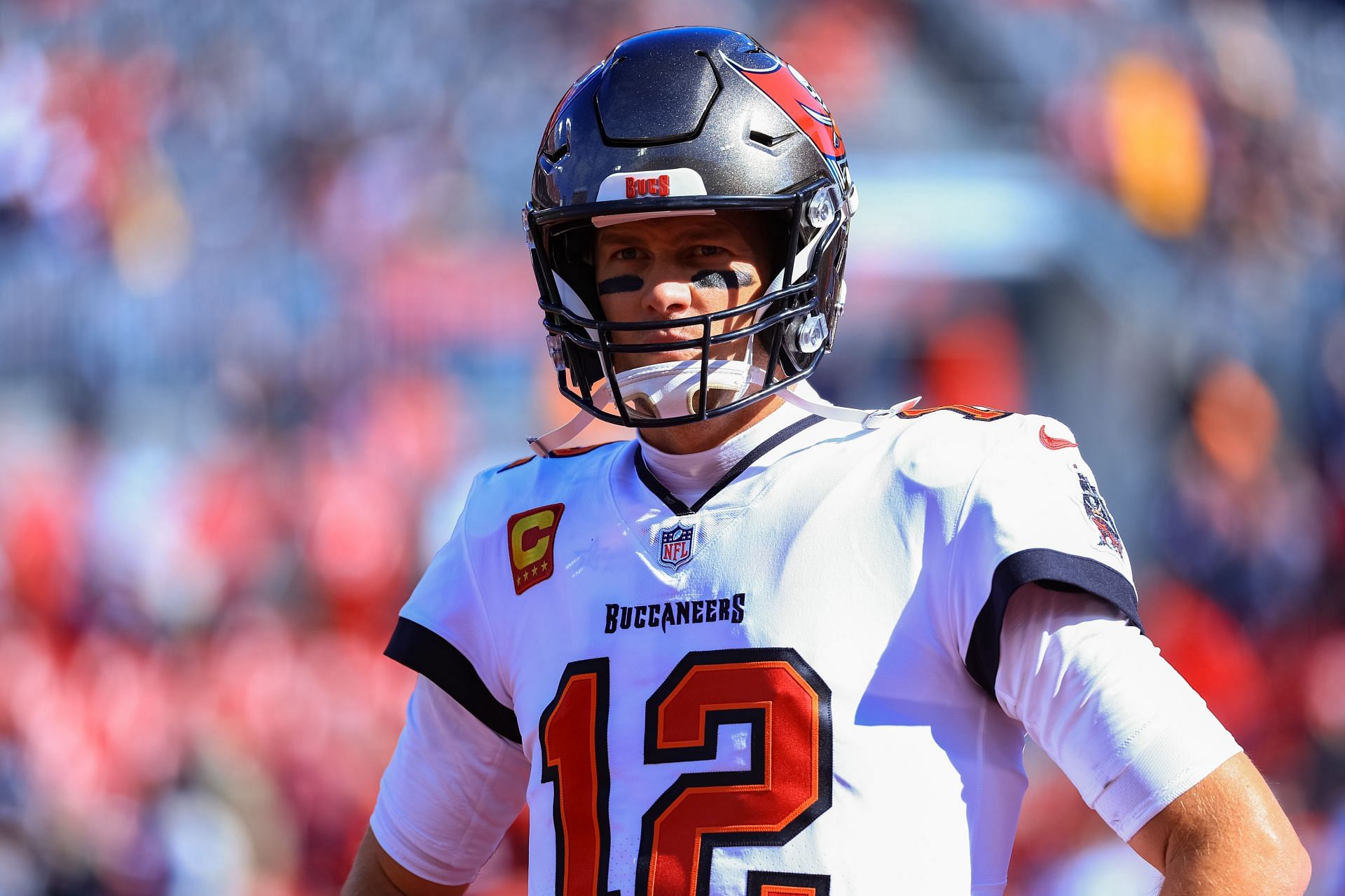 NFC Divisional Playoffs - Los Angeles Rams v Tampa Bay BuccaneersTom Brady #12 of the Tampa Bay Buccaneers looks on before the game against the Los Angeles Rams in the NFC Divisional Playoff game at Raymond James Stadium on January 23, 2022 in Tampa, Florida.