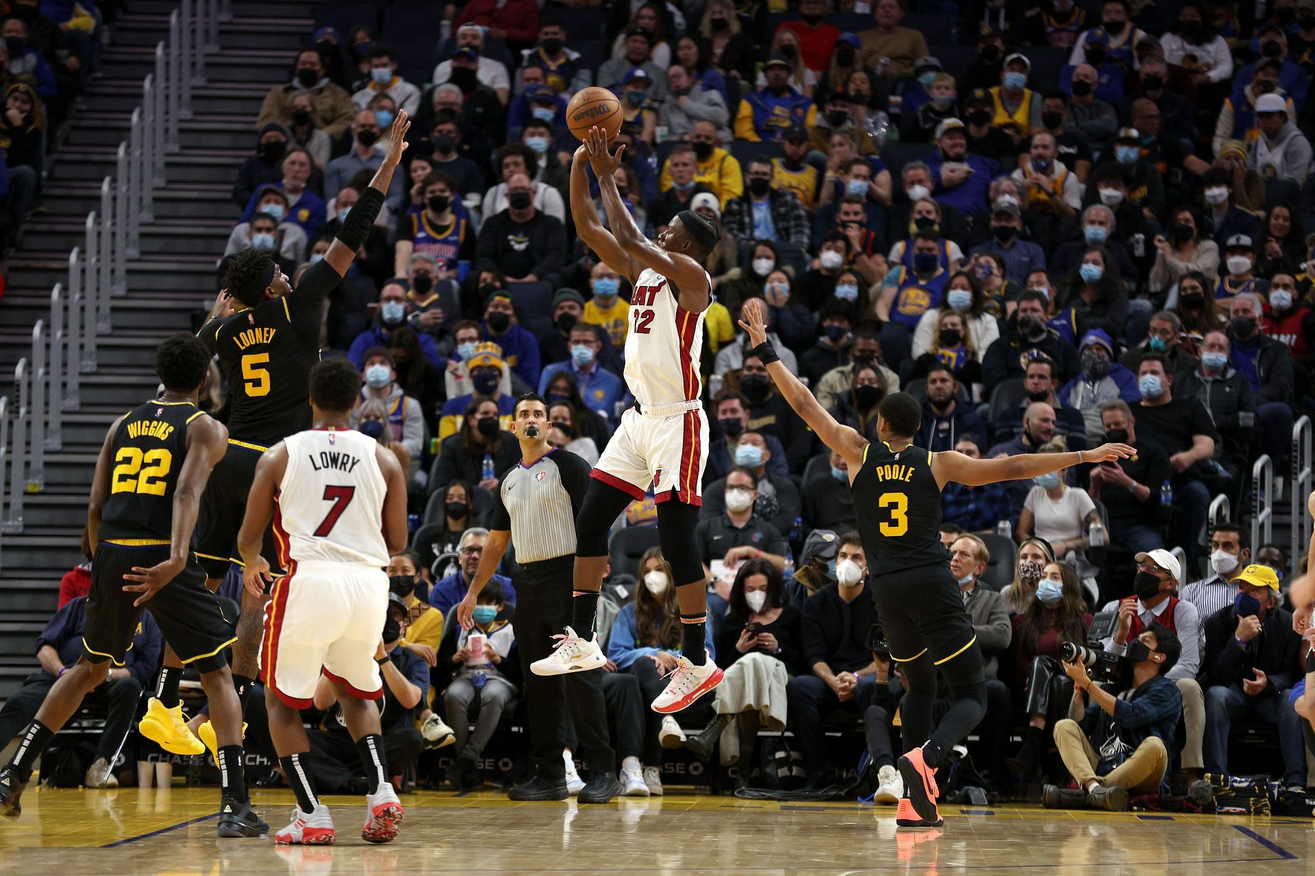 Jimmy Butler attempts a jump shot in the Miami Heat vs Golden State Warriors game