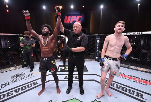 Aljamain Sterling celebrates beating Cory Sandhagen