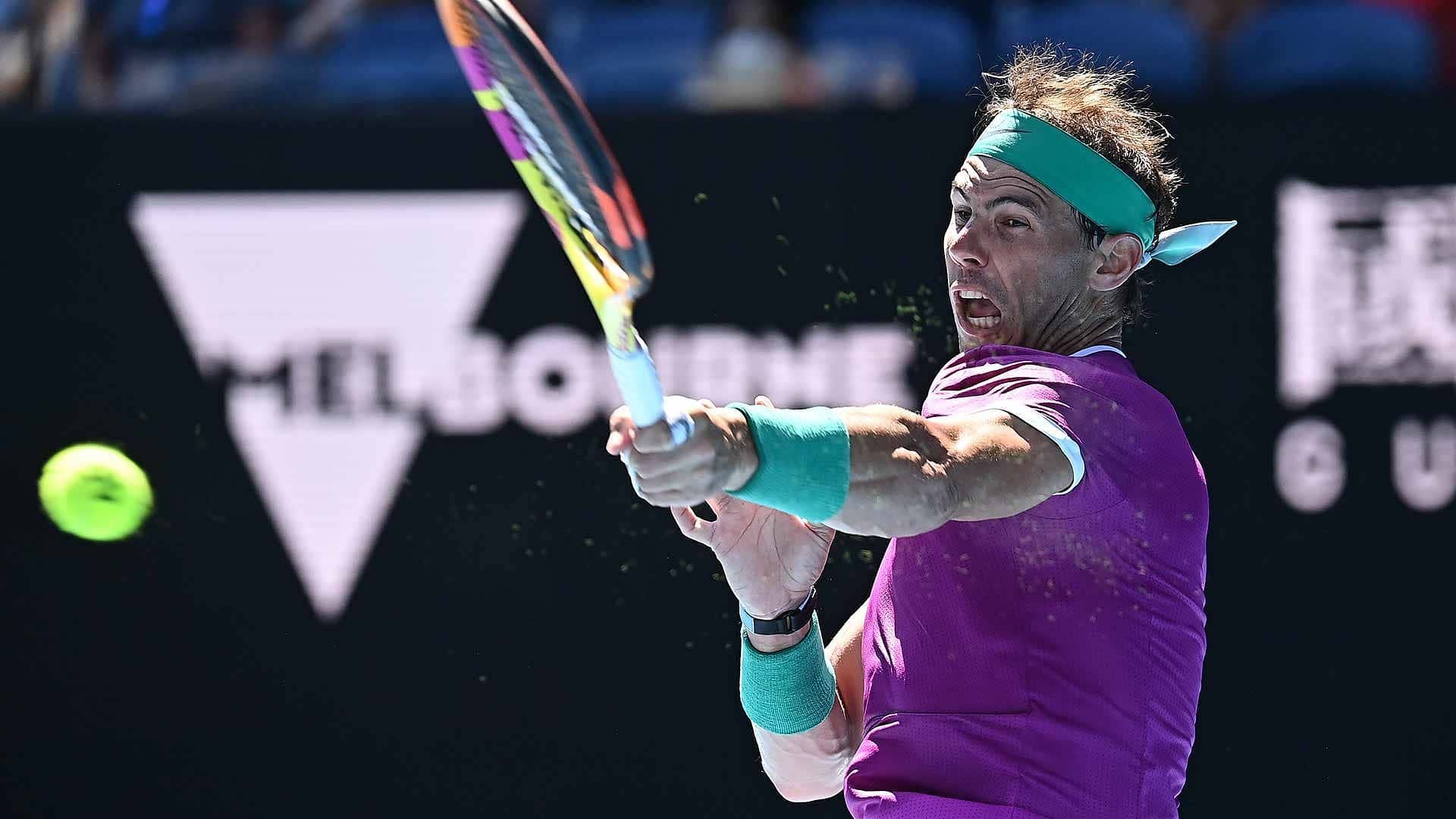 Rafael Nadal plays a forehand at the 2022 Australian Open