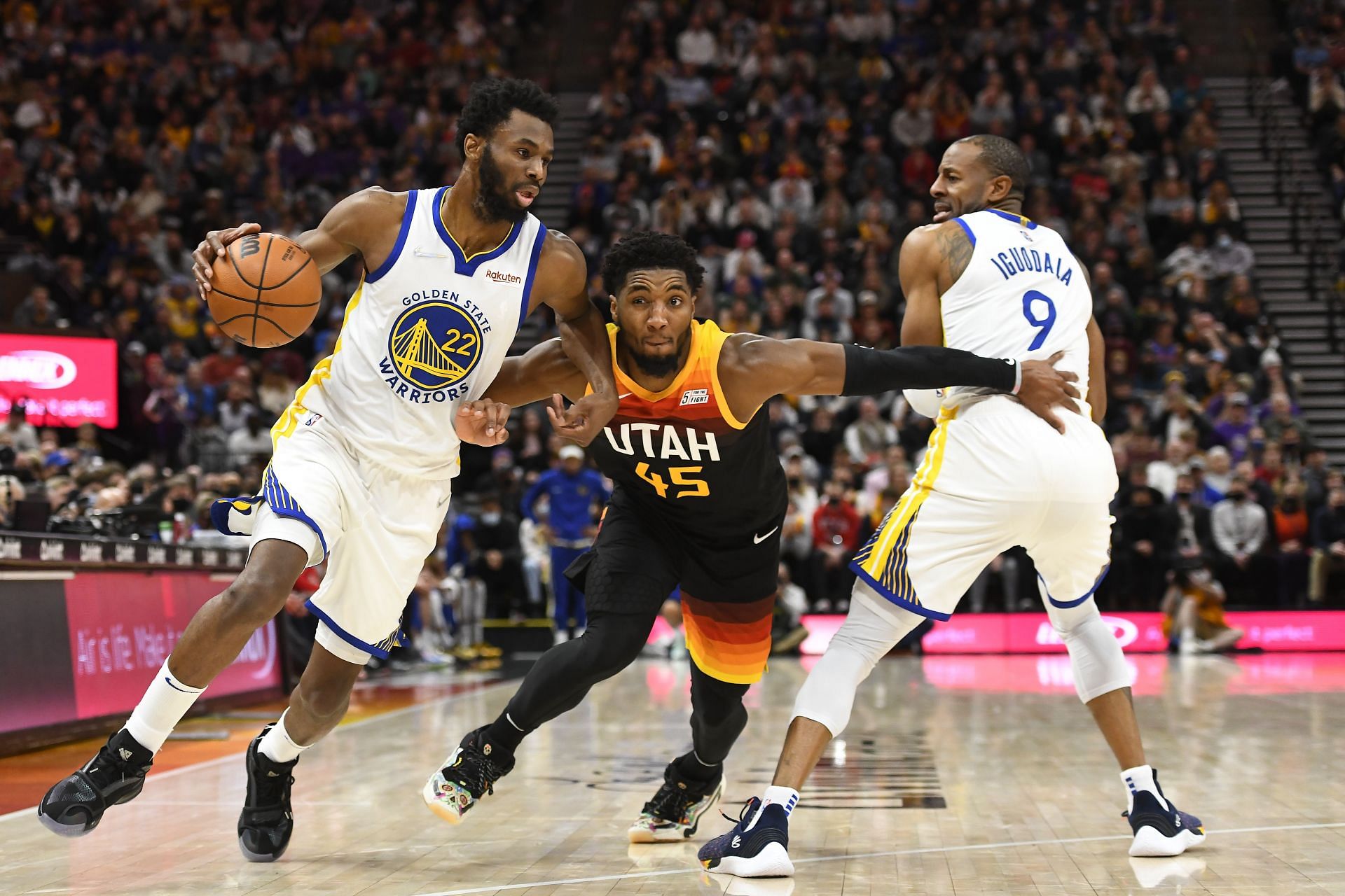 Golden State Warriors v Utah Jazz; Andrew Wiggins drives against Donovan Mitchell