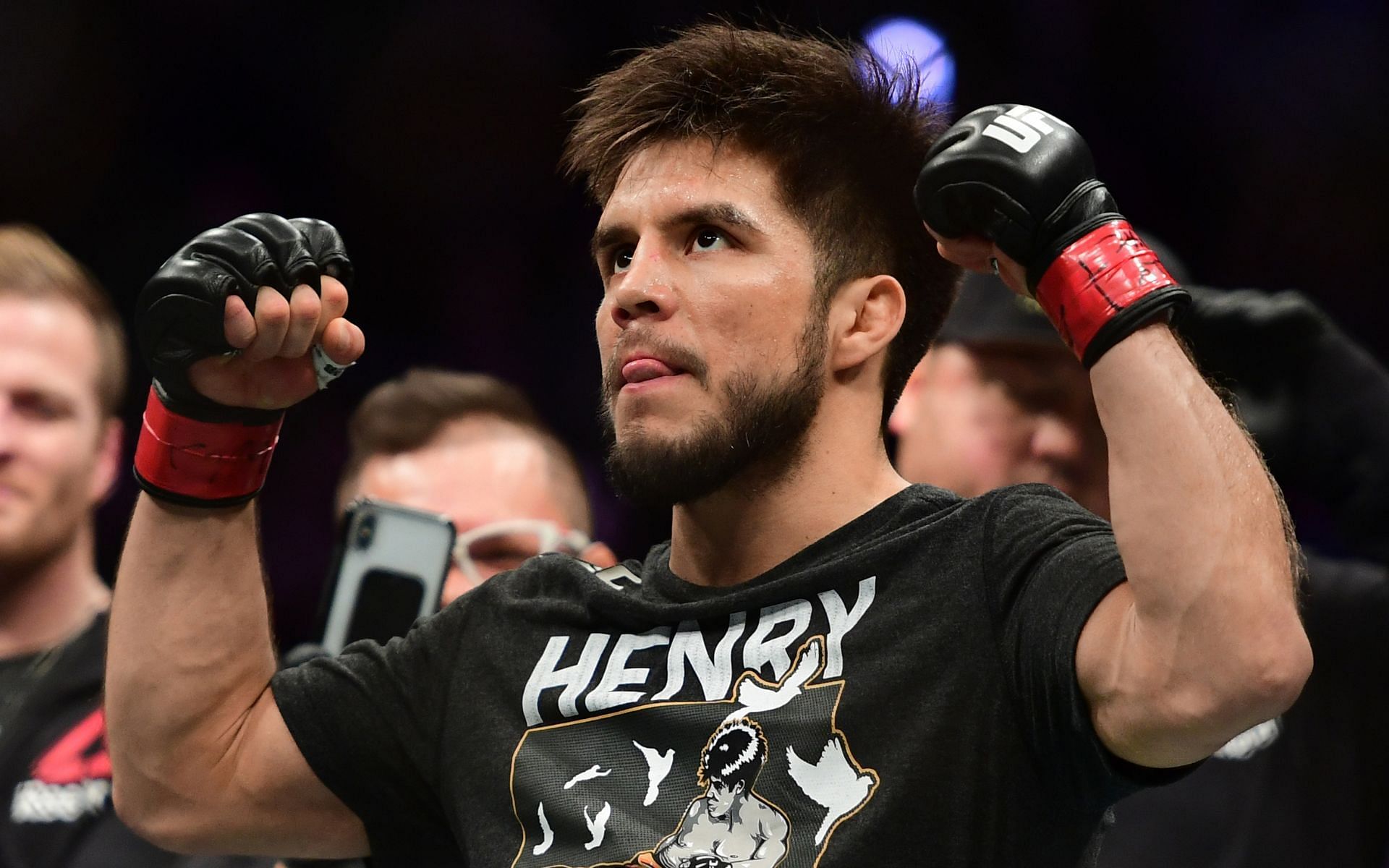 Former UFC flyweight and bantamweight champion Henry Cejudo reacts after a win