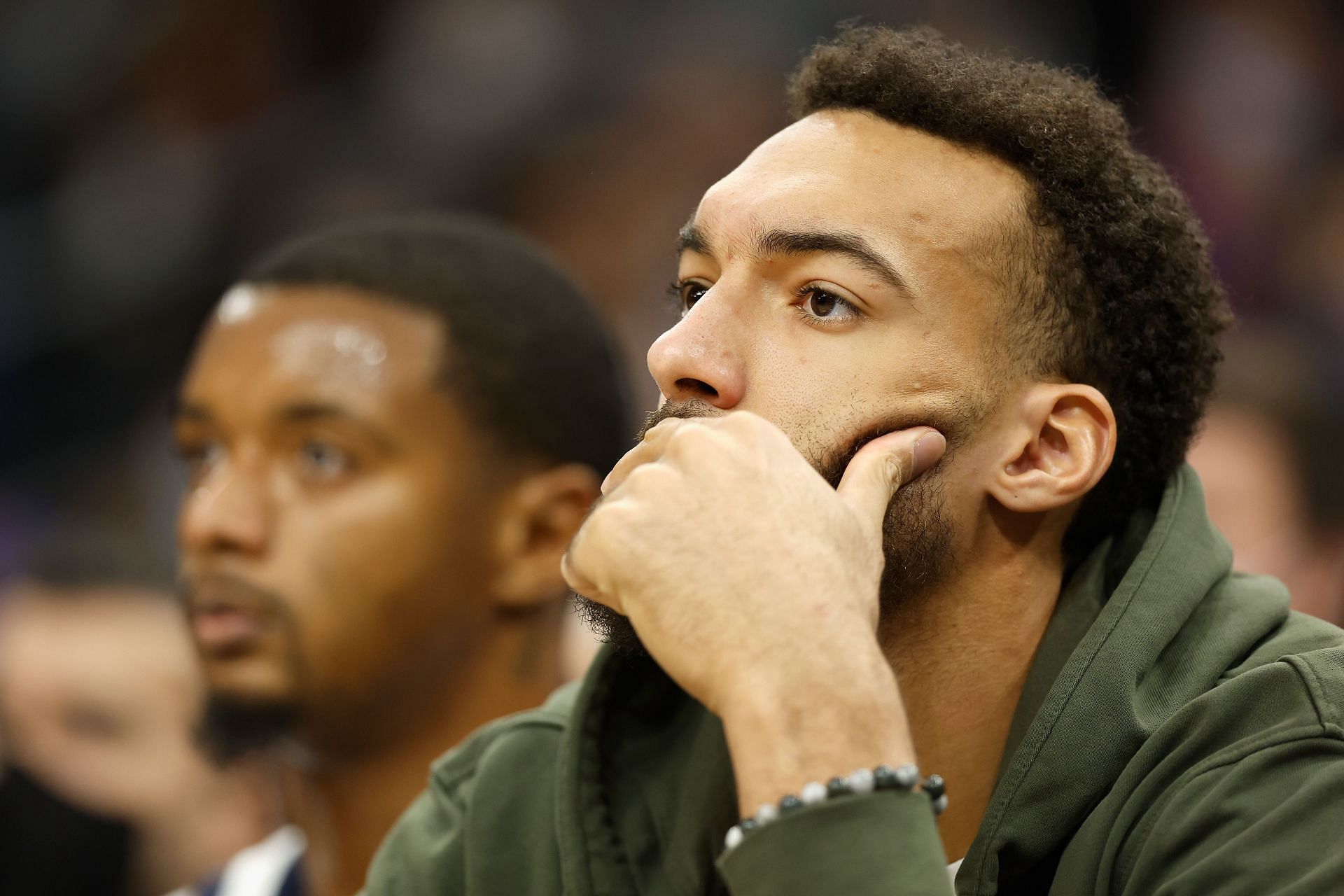 Rudy Gobert of the Utah Jazz watches from the bench
