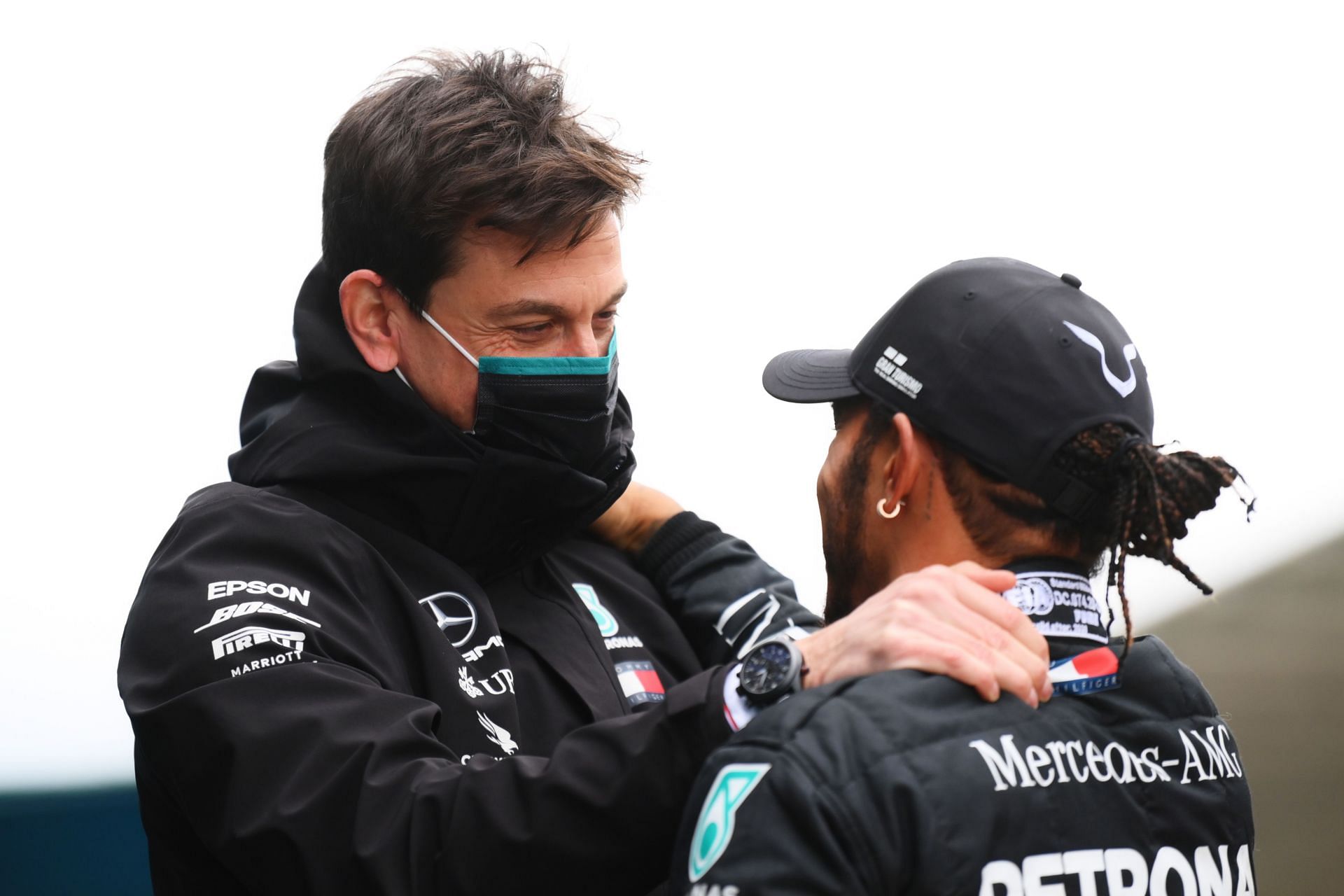 Toto Wolff (left) and Lewis Hamilton (right) (Photo by Clive Mason/Getty Images)