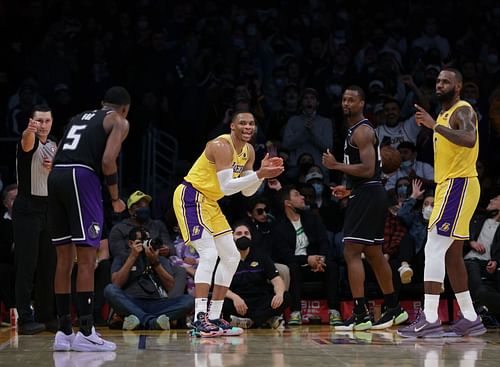 Russell Westbrook and LeBron James of the LA Lakers against Harrison Barnes and De'Aaron Fox of the Sacramento Kings