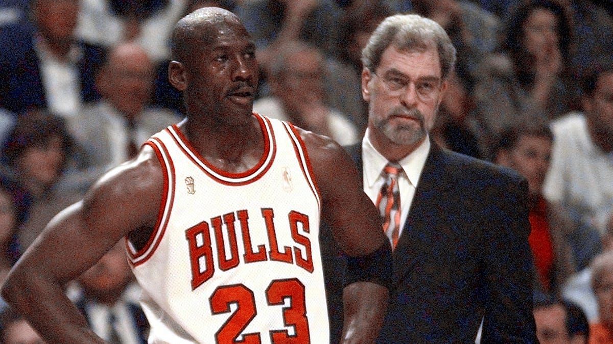 Michael Jordan and Chicago Bulls head coach Phil Jackson [Source: USA Today]