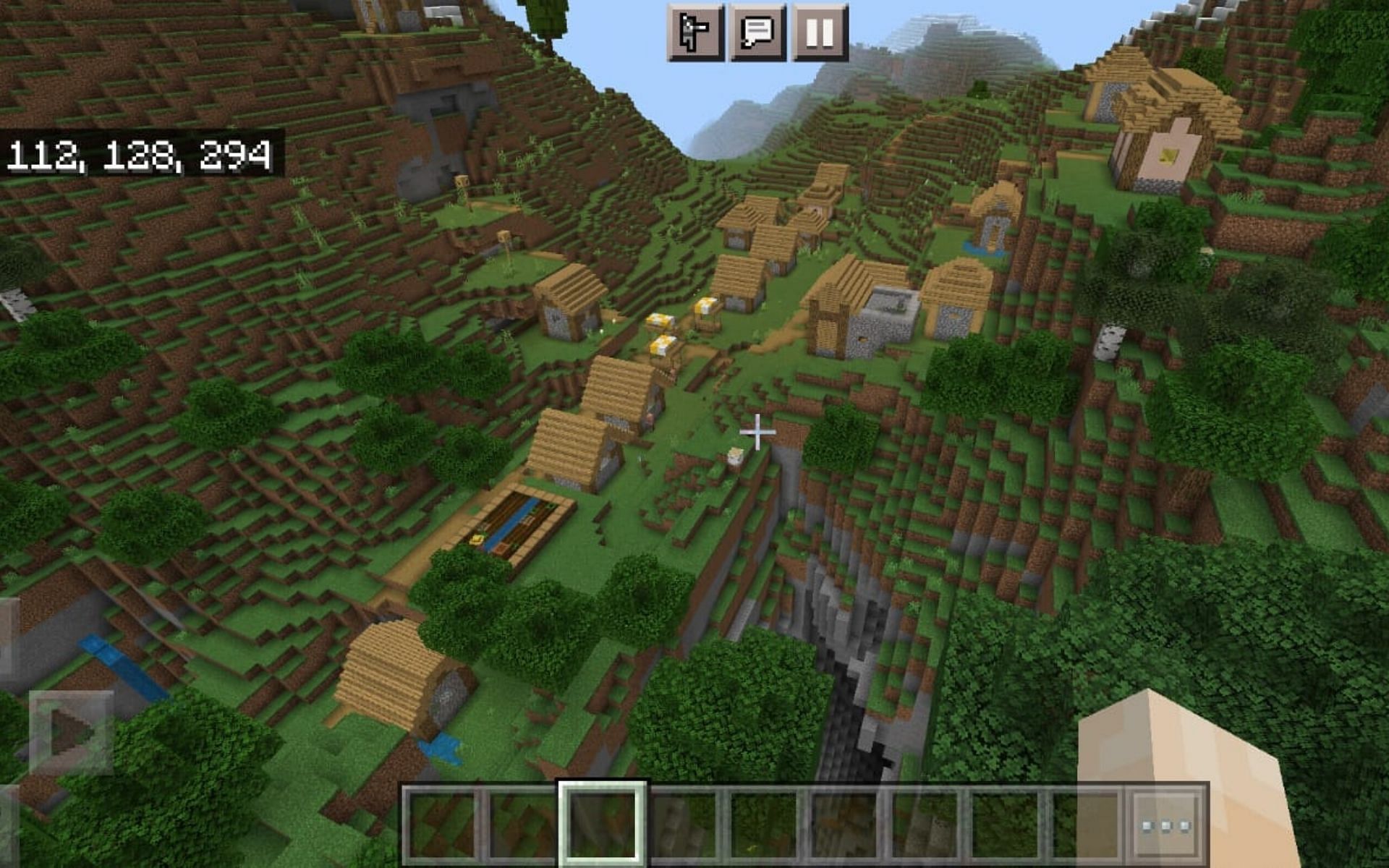 Village placed over a massive cavity (Image via Mojang)