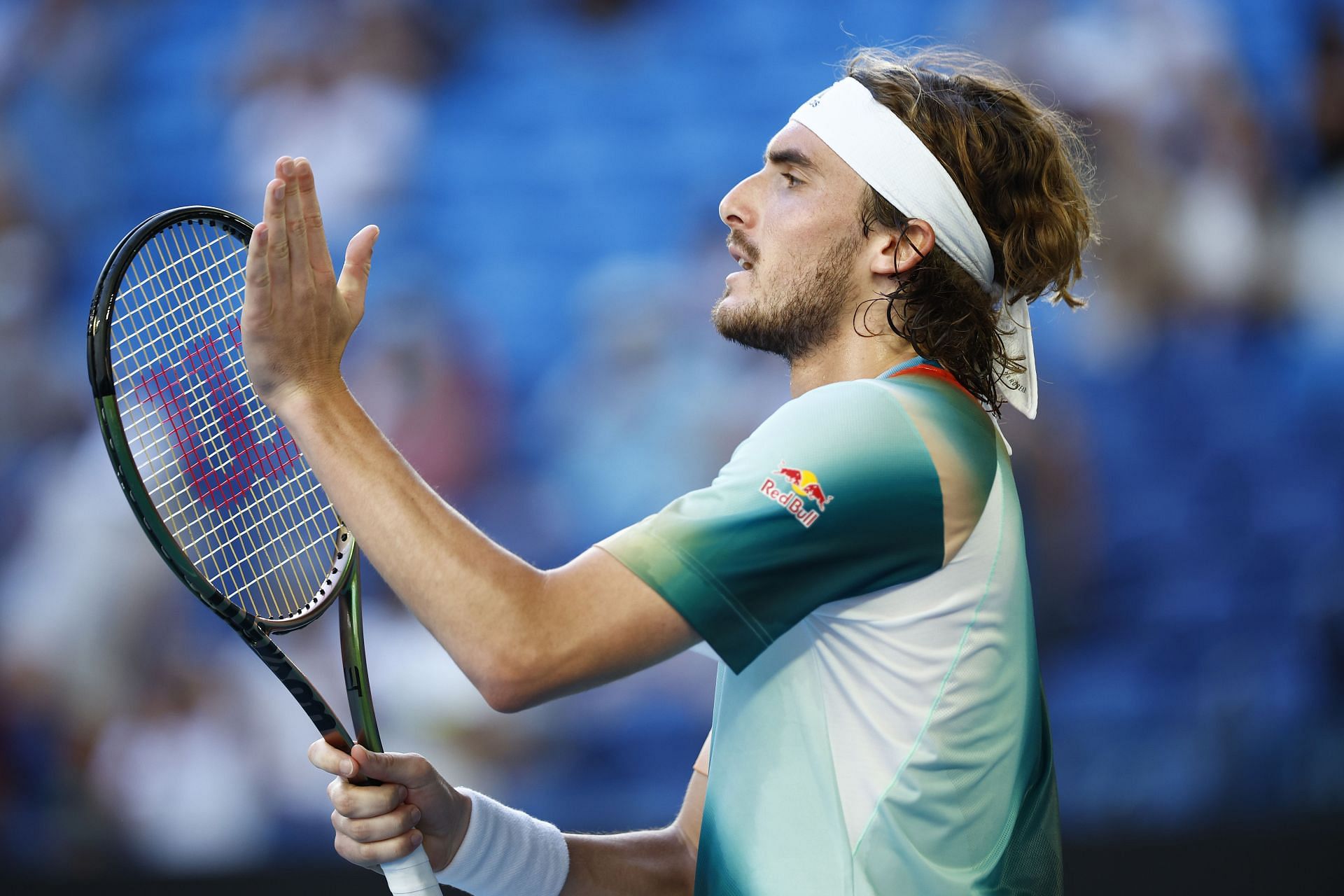 Stefanos Tsitsipas acknowledges the crowd after his third-round win at 2022 Australian Open
