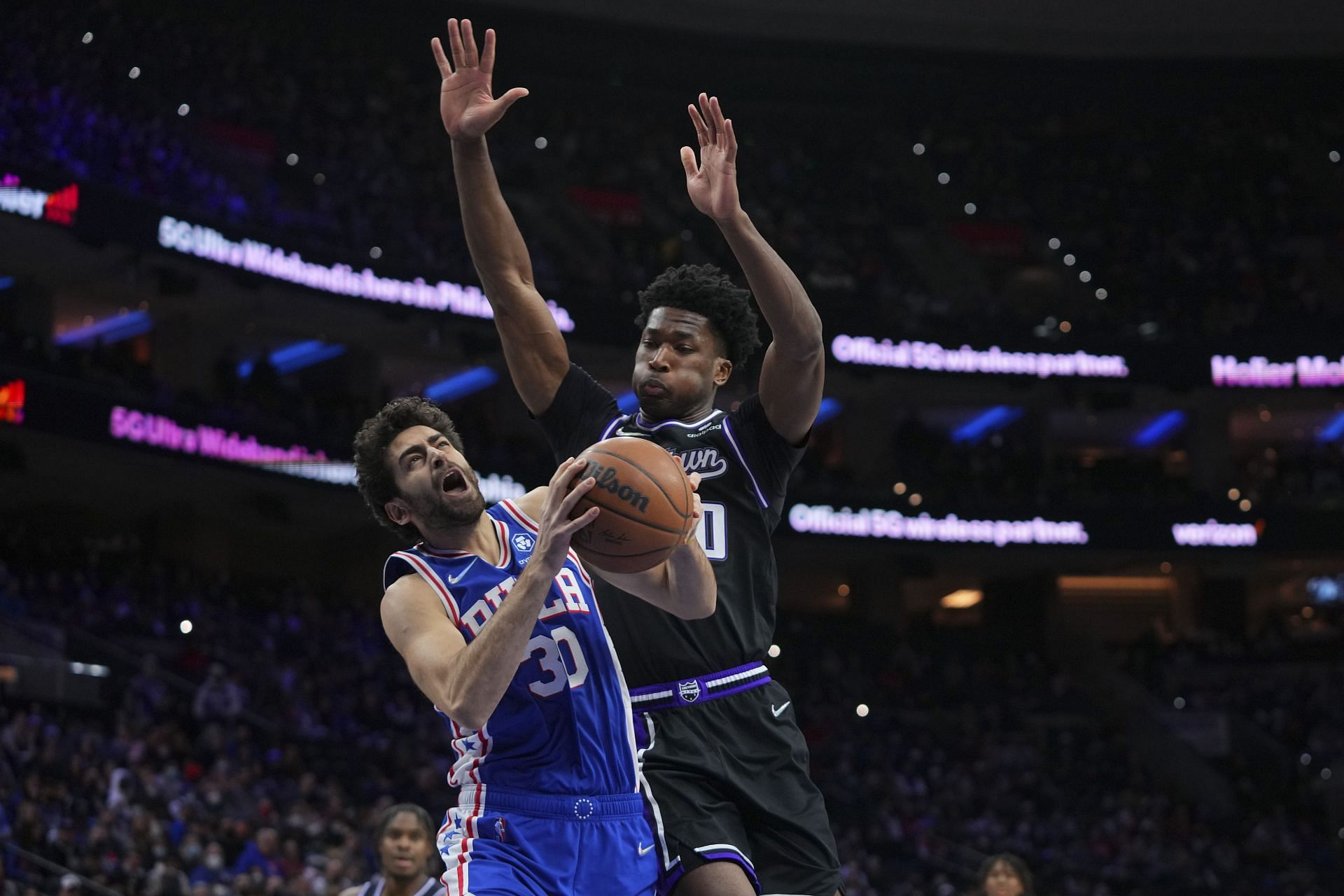 Furkan Korkmaz attempts to finish through contact