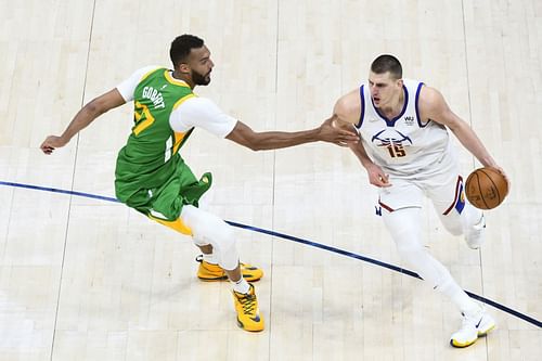 Nikola Jokic of the Denver Nuggets against Utah Jazz's Rudy Gobert