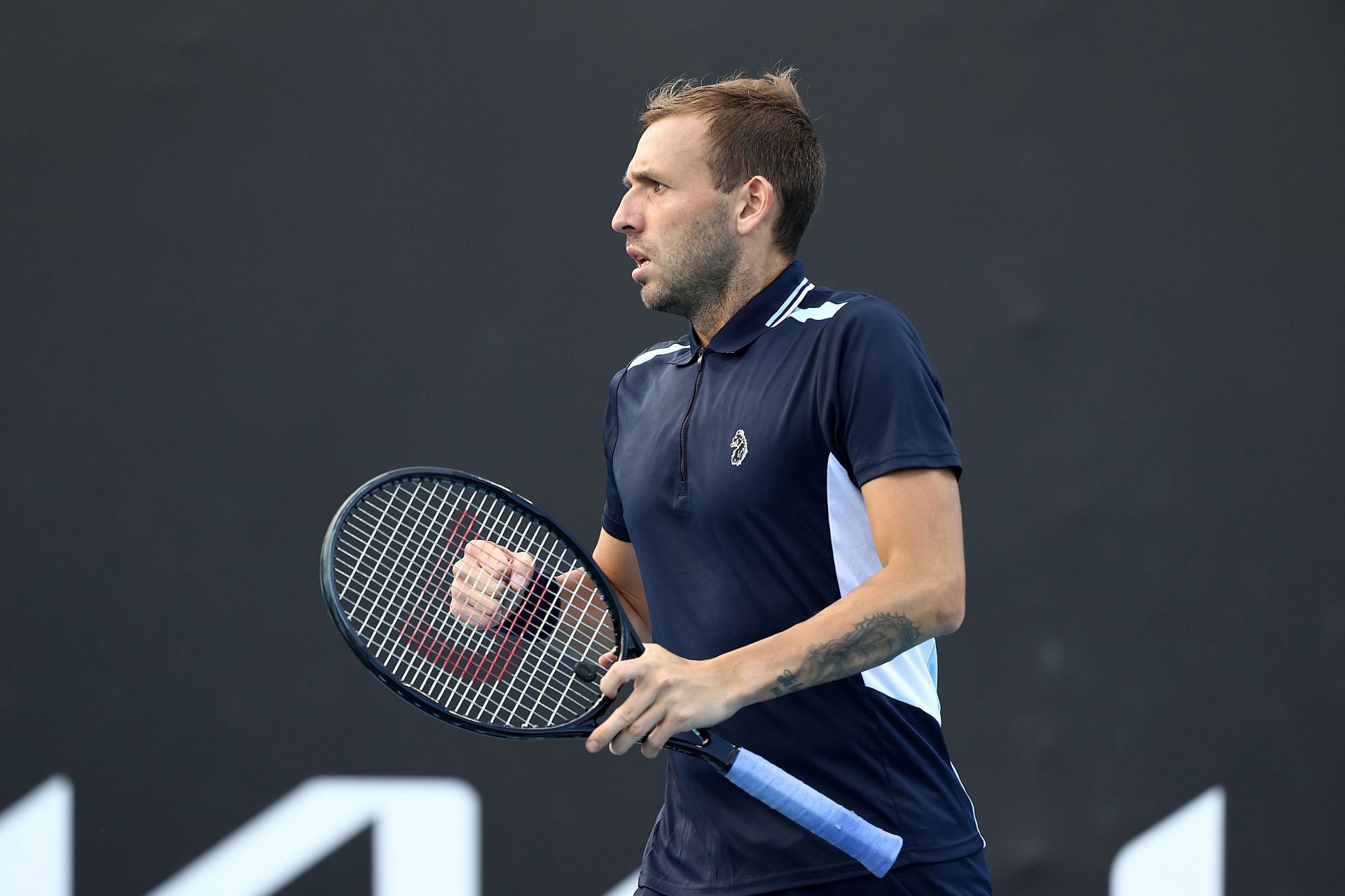 Dan Evans dismantled David Goffin to progress to the second round of the Australian Open