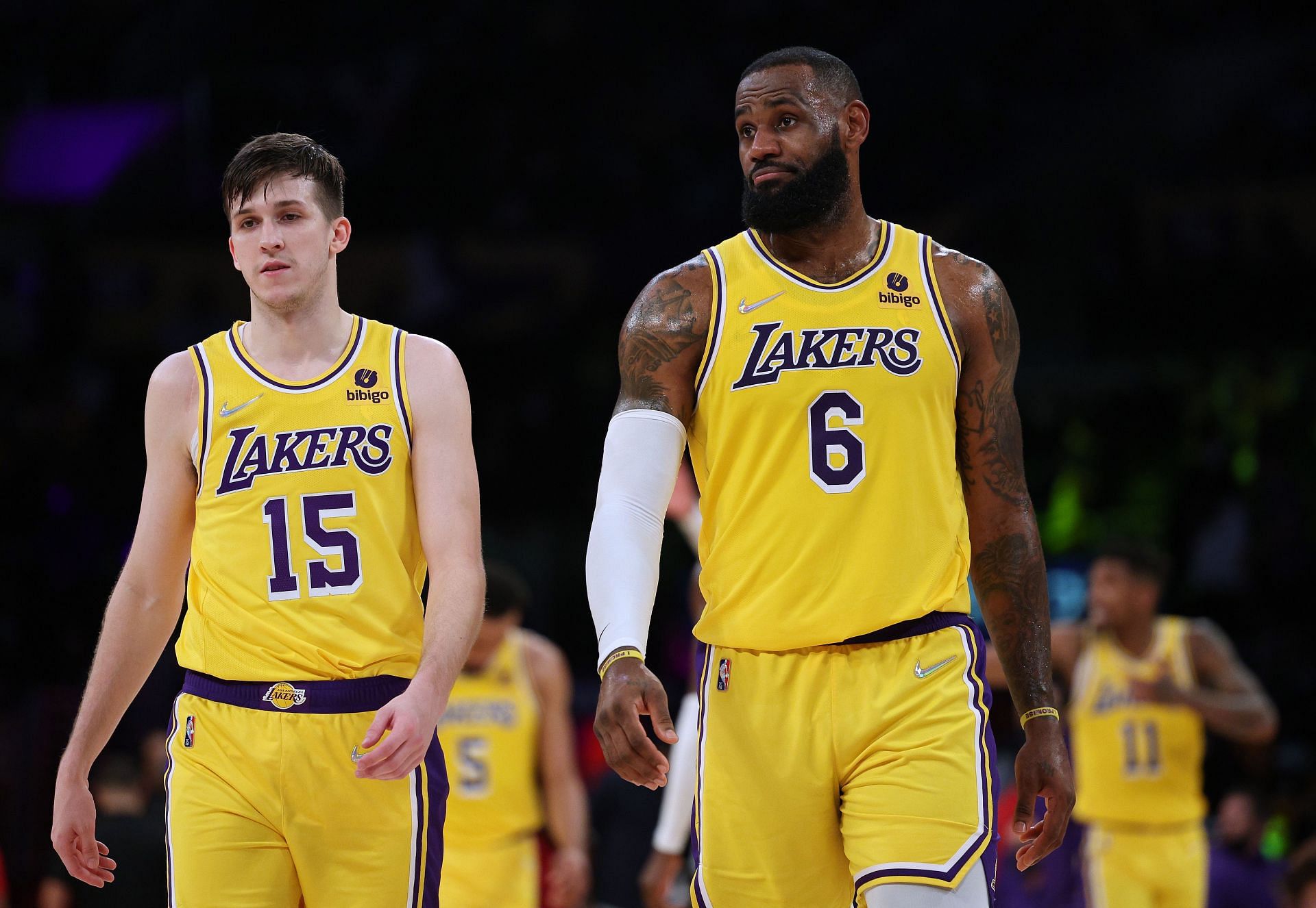 LeBron James (6) and Austin Reaves (15) of the LA Lakers walk back to the court after a timeout during a 111-104 Indiana Pacers&#039; win Wednesday in Los Angeles, California.