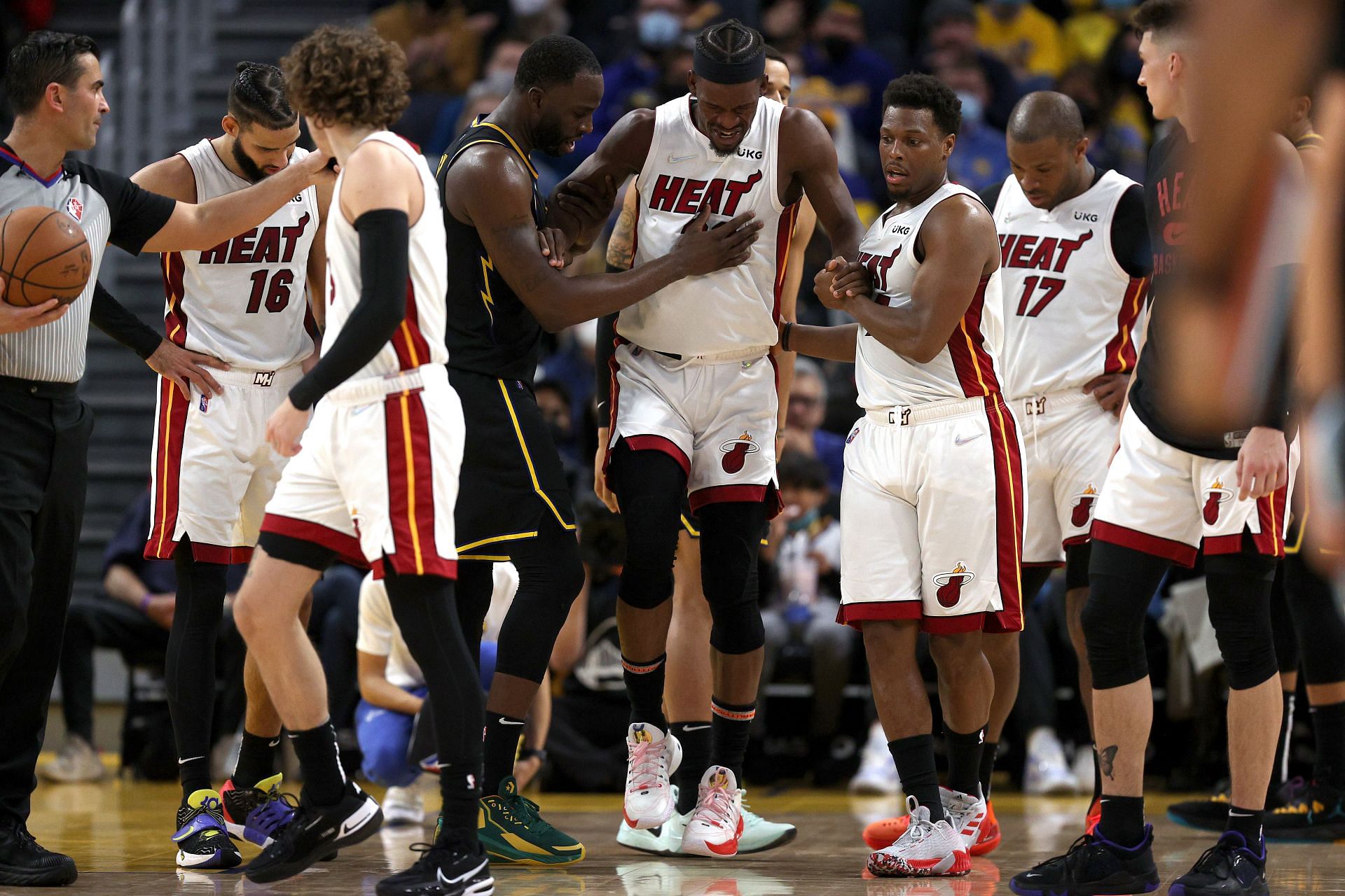 Jimmy Butler of the Miami Heat suffers an injury against the Golden State Warriors