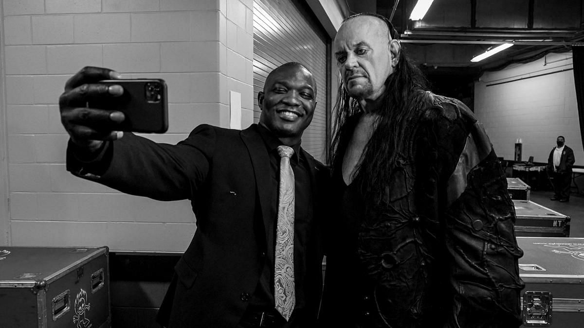 Shelton Benjamin taking a selfie with The Undertaker, who is on TikTok