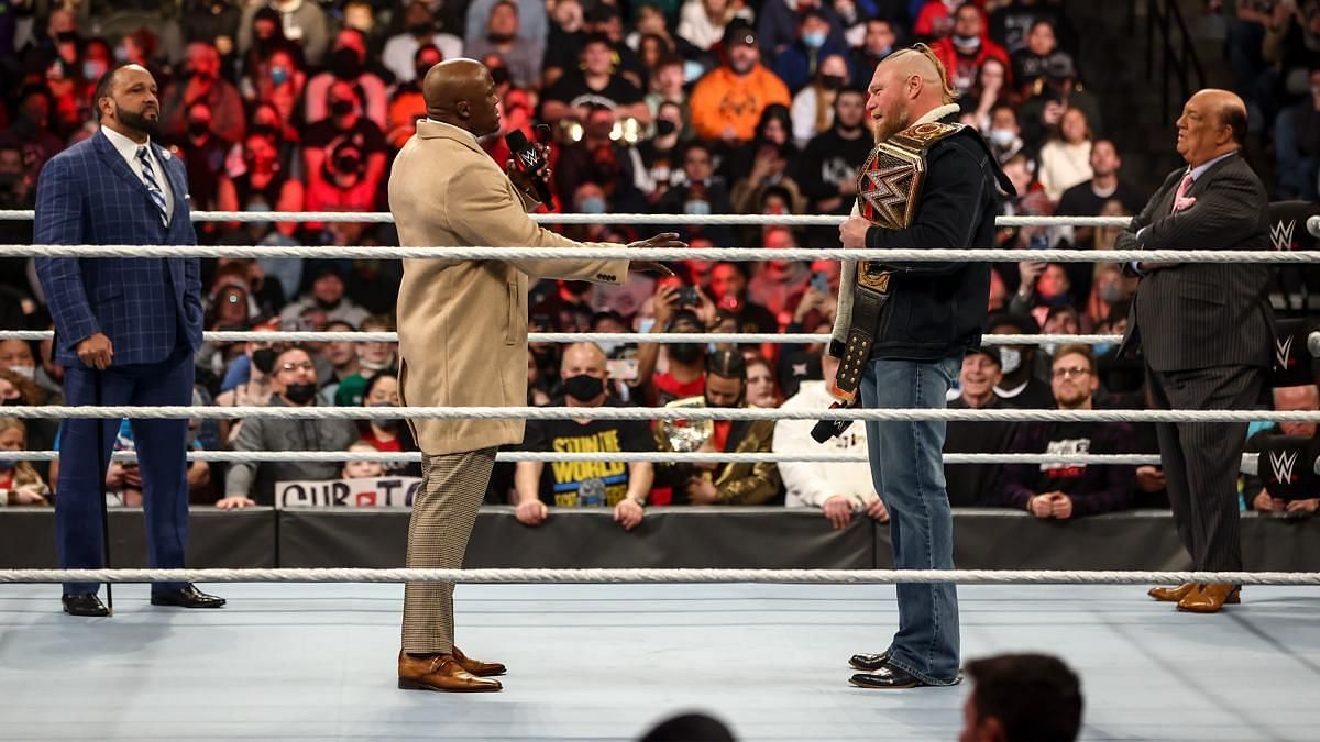 Bobby Lashley standing face to face with Brock Lesnar