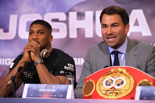 (L) Anthony Joshua's promoter Eddie Hearn (R) has confirmed that 'AJ' has been offered to step aside