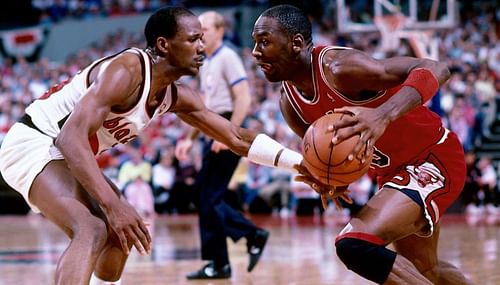 Michael Jordan #23 of the Chicago Bulls looks to drive against Clyde Drexler #22 of the Portland Trail Blazers