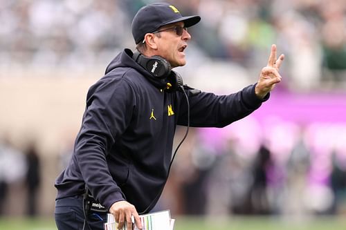 Michigan head coach Jim Harbaugh vs Michigan State