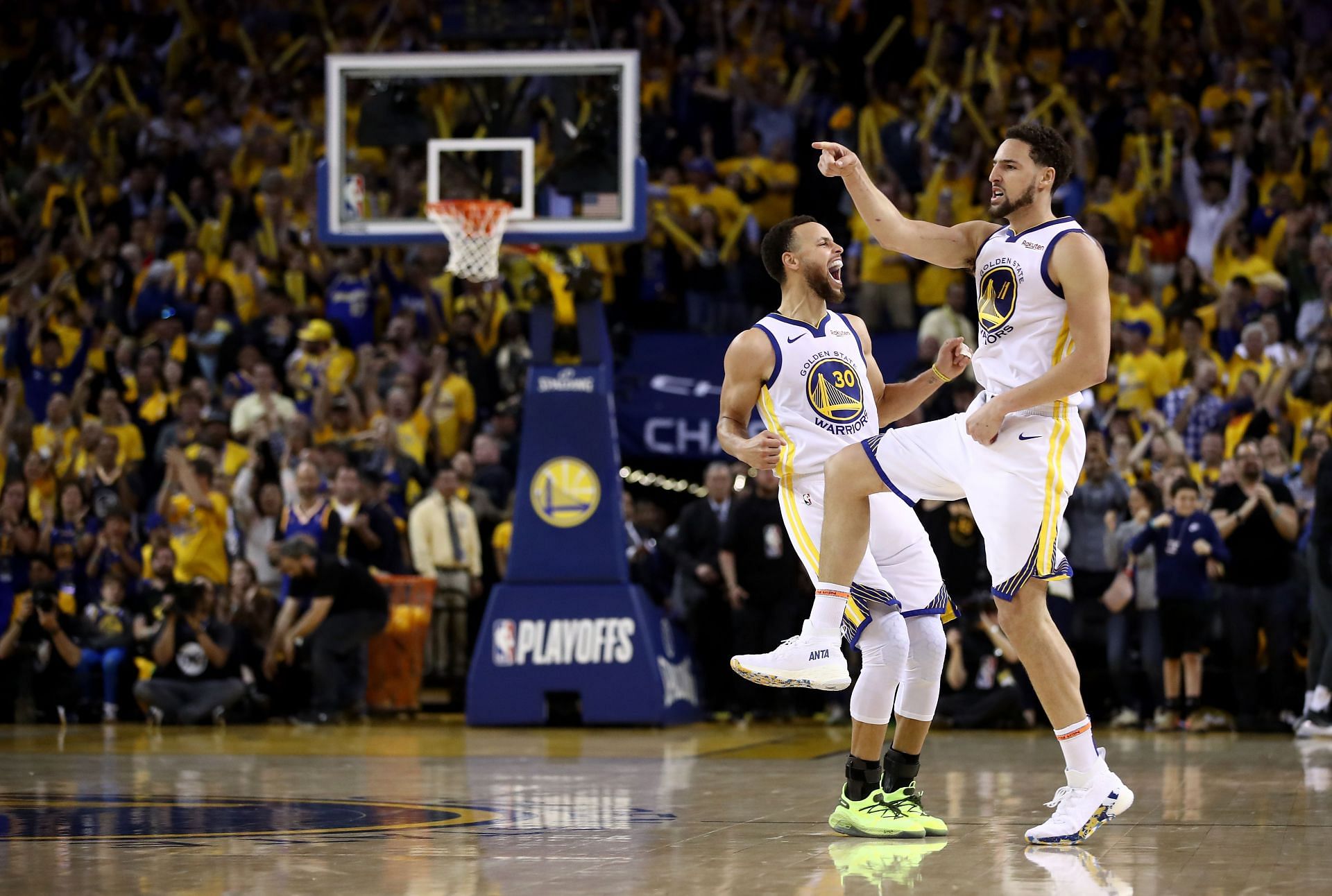 Steph Curry, left, of the Golden State Warriors celebrates with Klay Thompson, right