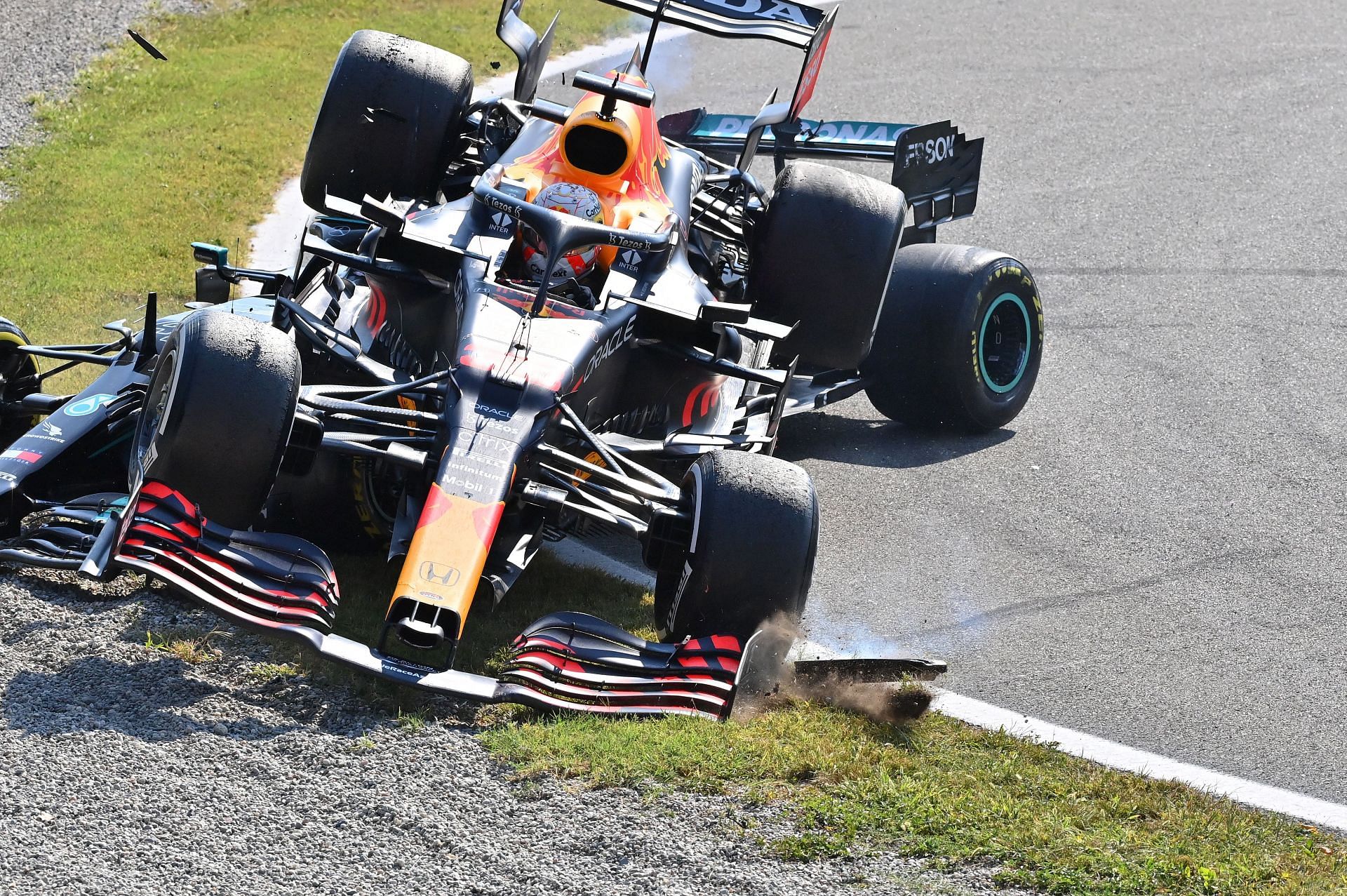 Verstappen lands atop Hamilton after colliding at turn 1 at Monza