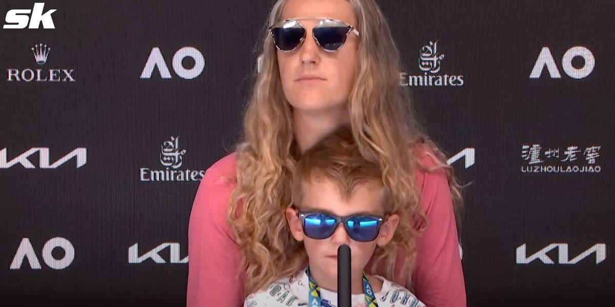 Victoria Azarenka with son Leo at a press conference during the 2022 Australian Open