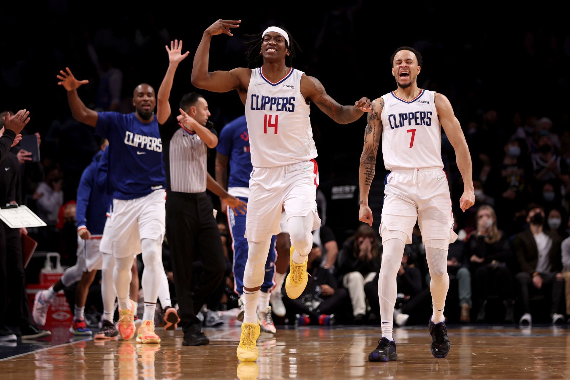 Terance Mann (#14) of the LA Clippers celebrates after making a three-pointer