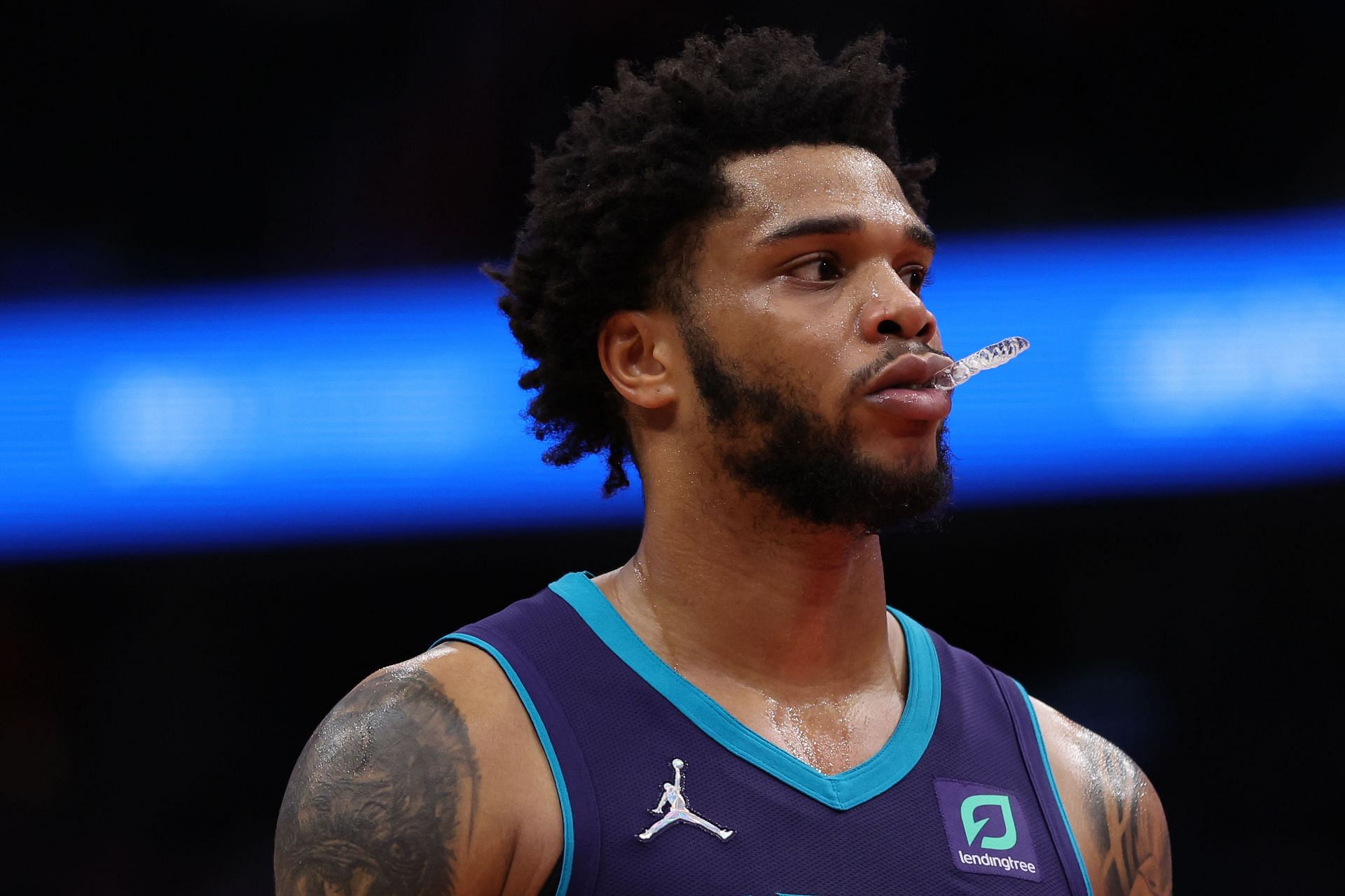 Miles Bridges looks on during a Charlotte Hornets game