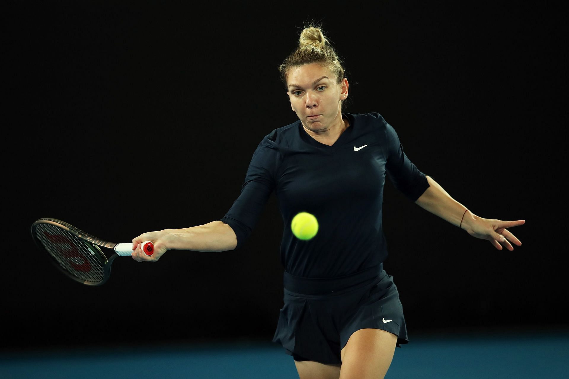 Simona Halep in action against Destanee Aiava at Melbourne Summer Set 1