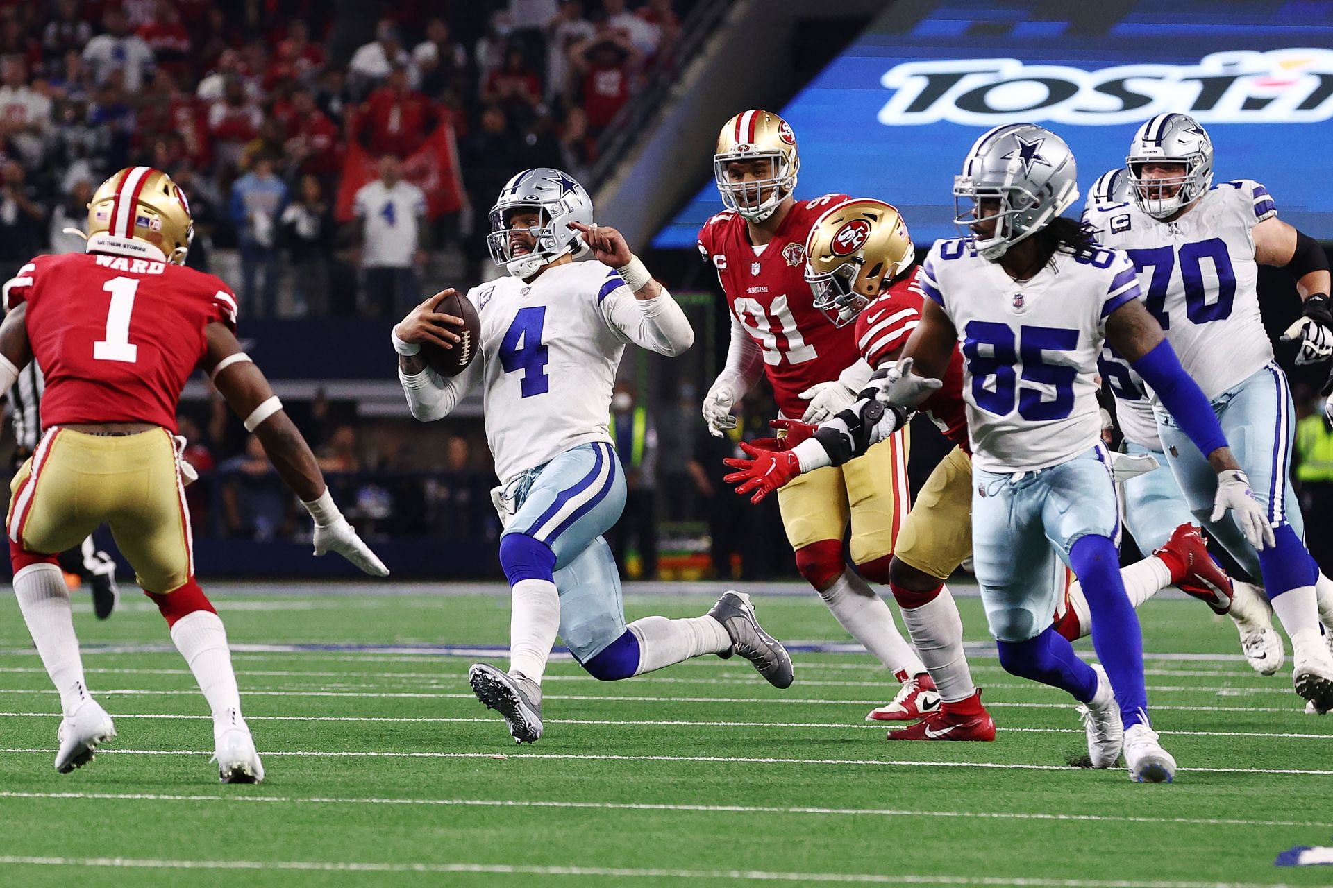 Dallas Cowboys quarterback Tony Romo (9) calls an audible at the line in  the NFL football game between the San Diego Chargers and Dallas Cowboys at  Cowboys Stadium in Arlington, Texas. The