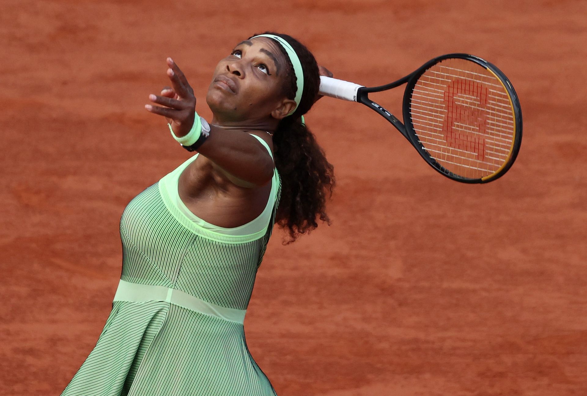 Serena Williams serves during the 2021 French Open