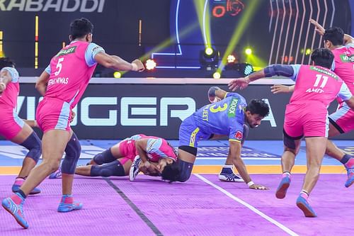 Pink Panthers' defenders tackle a Tamil Thalaivas raider during their previous Pro Kabaddi League encounter. [Image Courtesy: Pink Panthers Twitter]