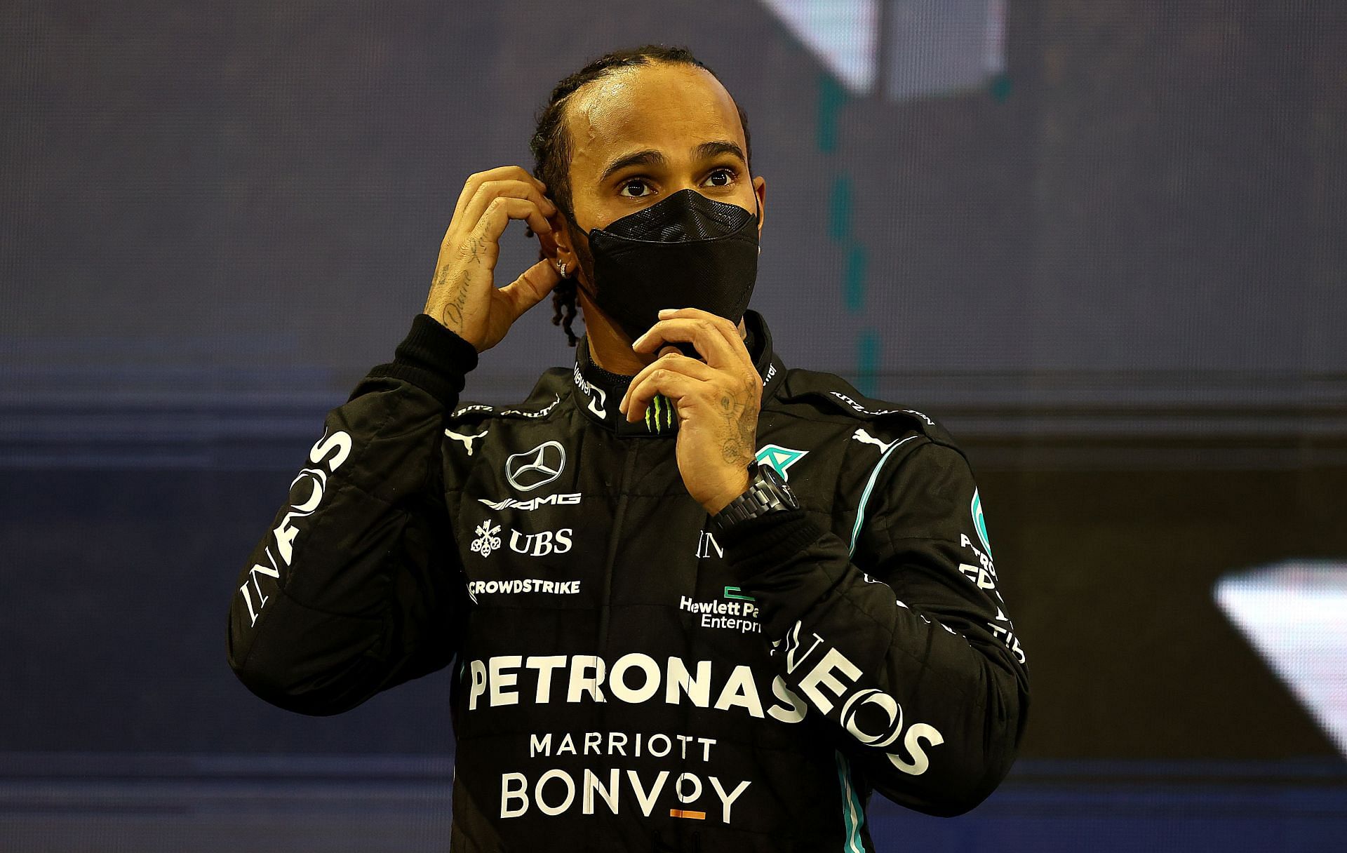 Lewis Hamilton on the podium of the 2021 Abu Dhabi Grand Prix (Photo by Bryn Lennon/Getty Images)