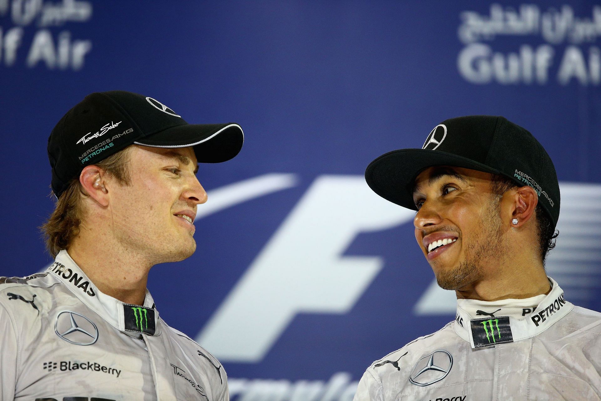 Lewis Hamilton and Nico Rosberg on the 2014 Bahrain GP podium in Sakhir. (Photo by Clive Mason/Getty Images)