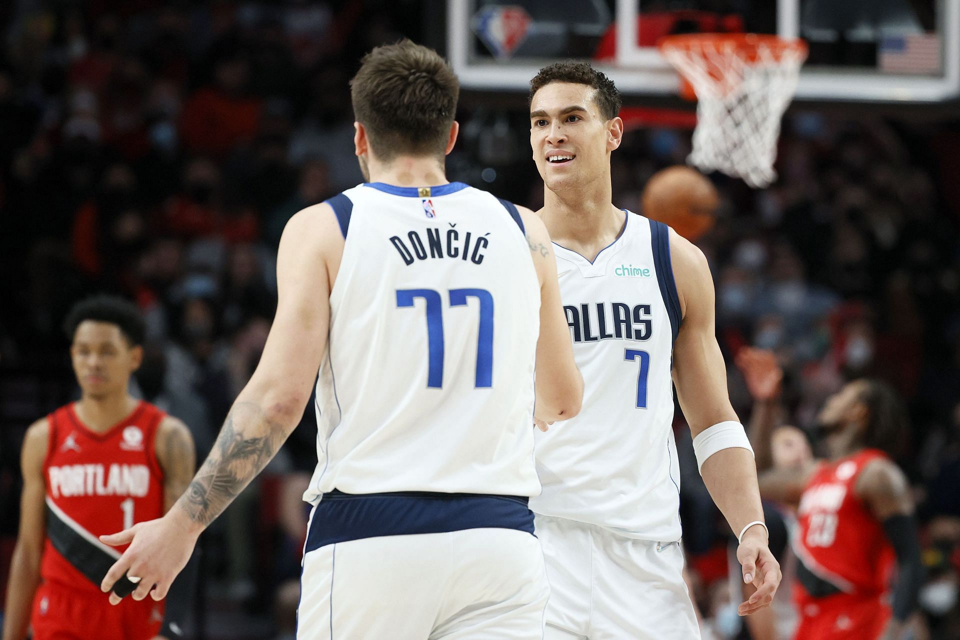 Luka Doncic and Dwight Powell of the Dallas Mavericks