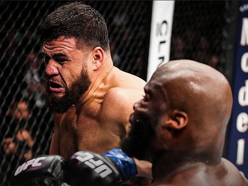 Tai Tuivasa and Derrick Lewis at UFC 271 [Image courtesy of @espnmma]