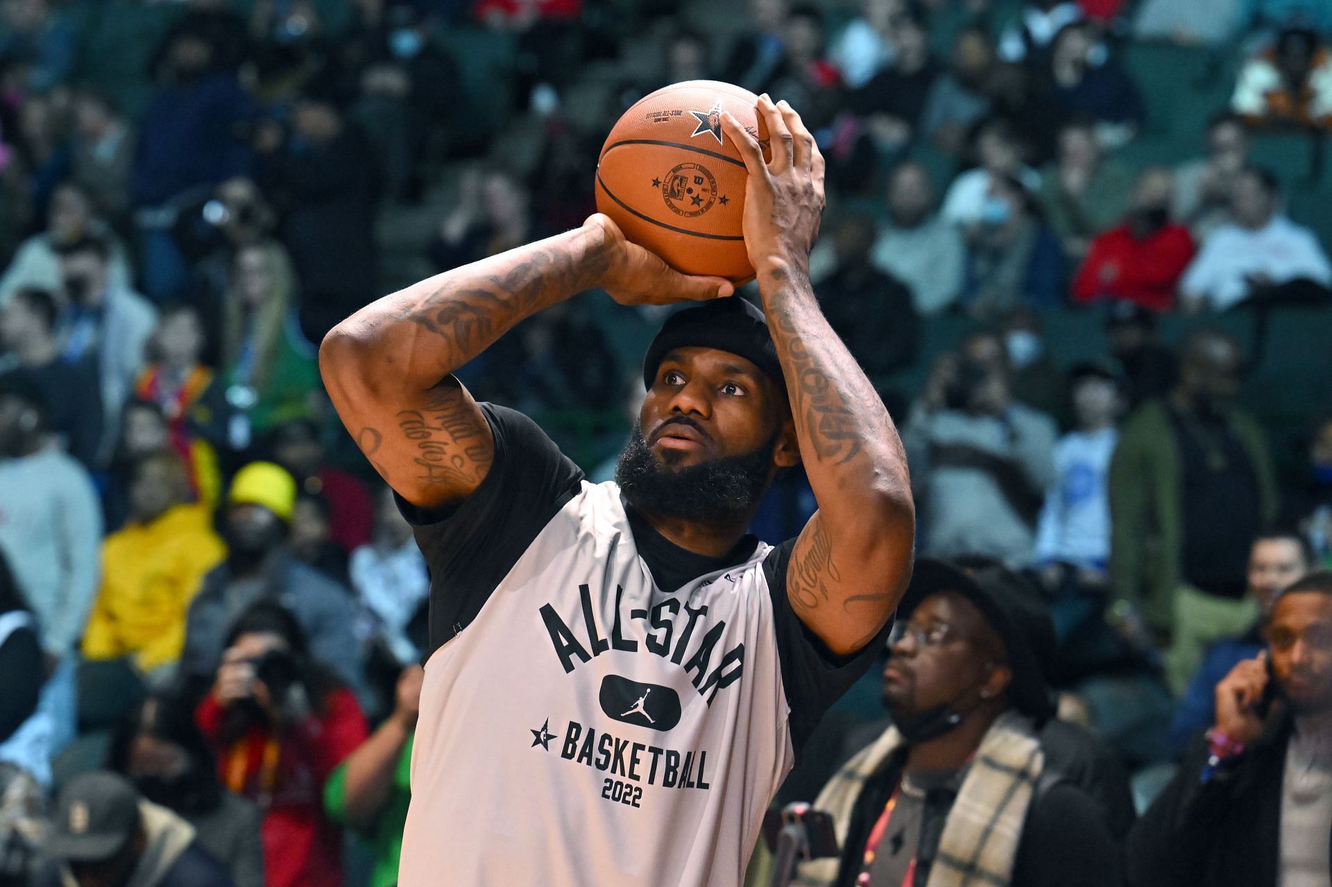 LeBron James attempts a shot at the NBA All-Star Practice.