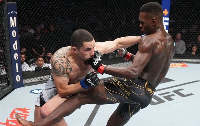Who won the fight between Israel Adesanya and Robert Whittaker (12th February 2022)?