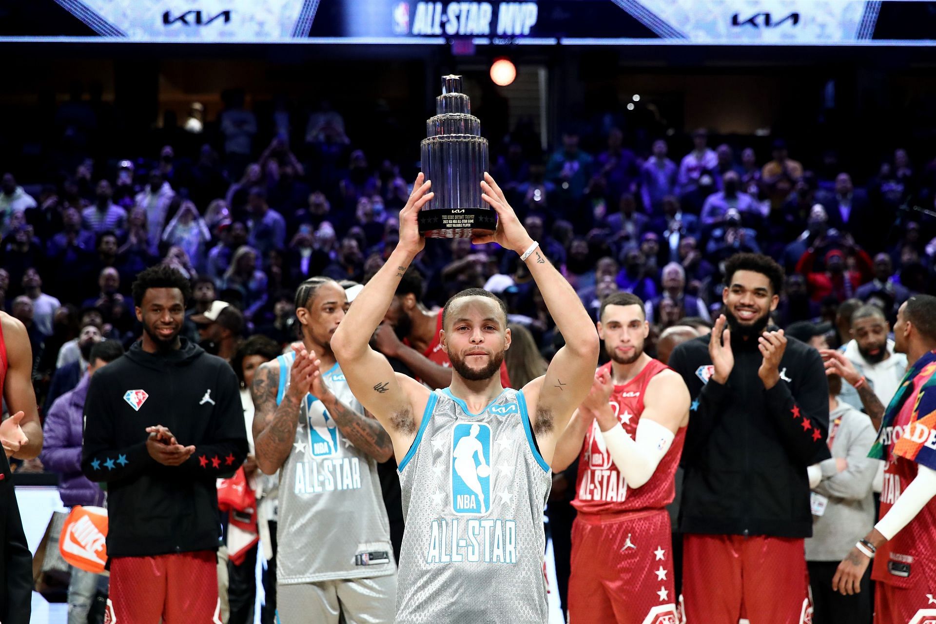Steph Curry lifts the Kobe Bryant All-Star Game MVP trophy Sunday in Cleveland, Ohio.