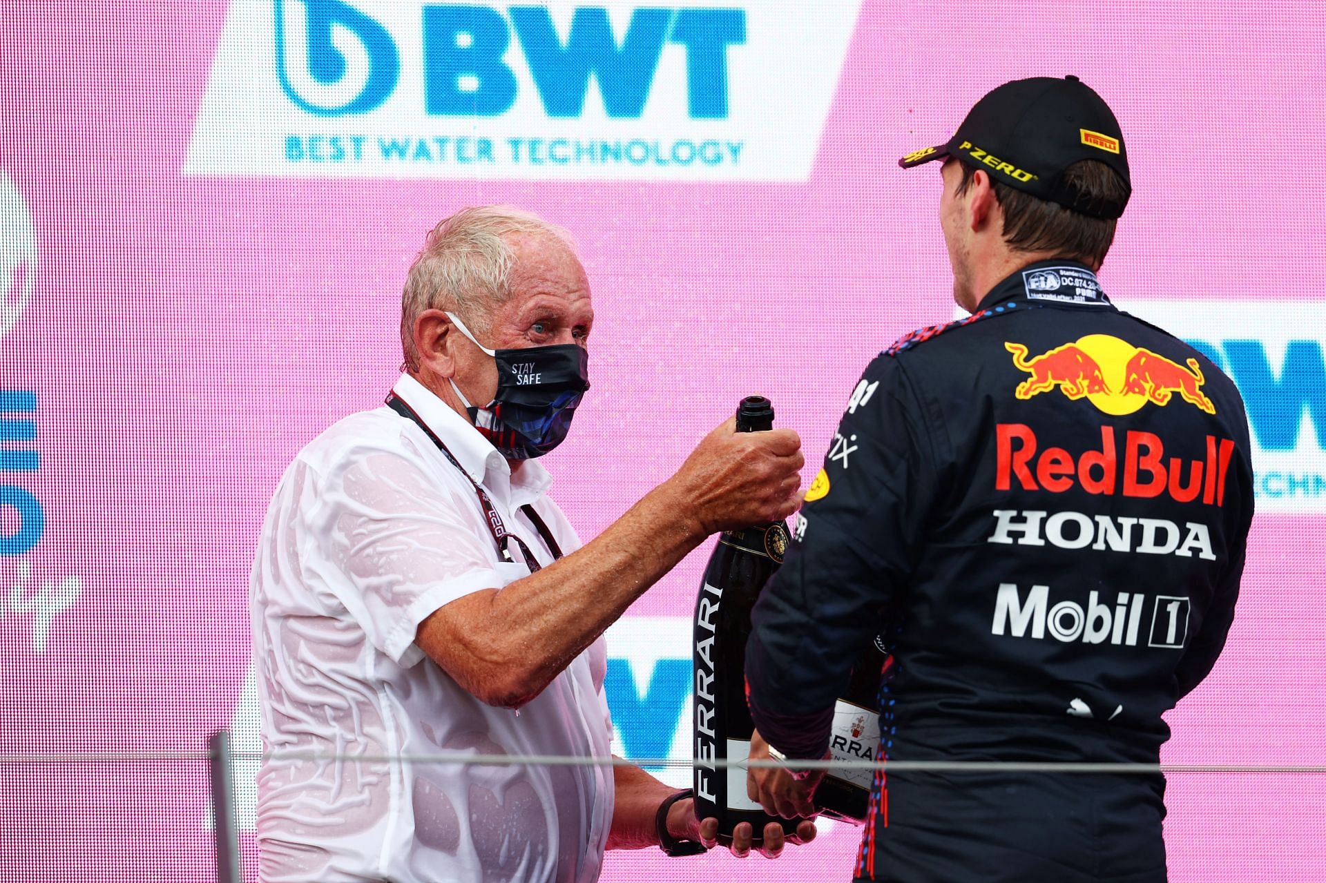 Dr. Helmut Marko (left) and Max Verstappen (right) on the podium after the 2021 Styrian Grand Prix (Photo by Clive Rose/Getty Images)