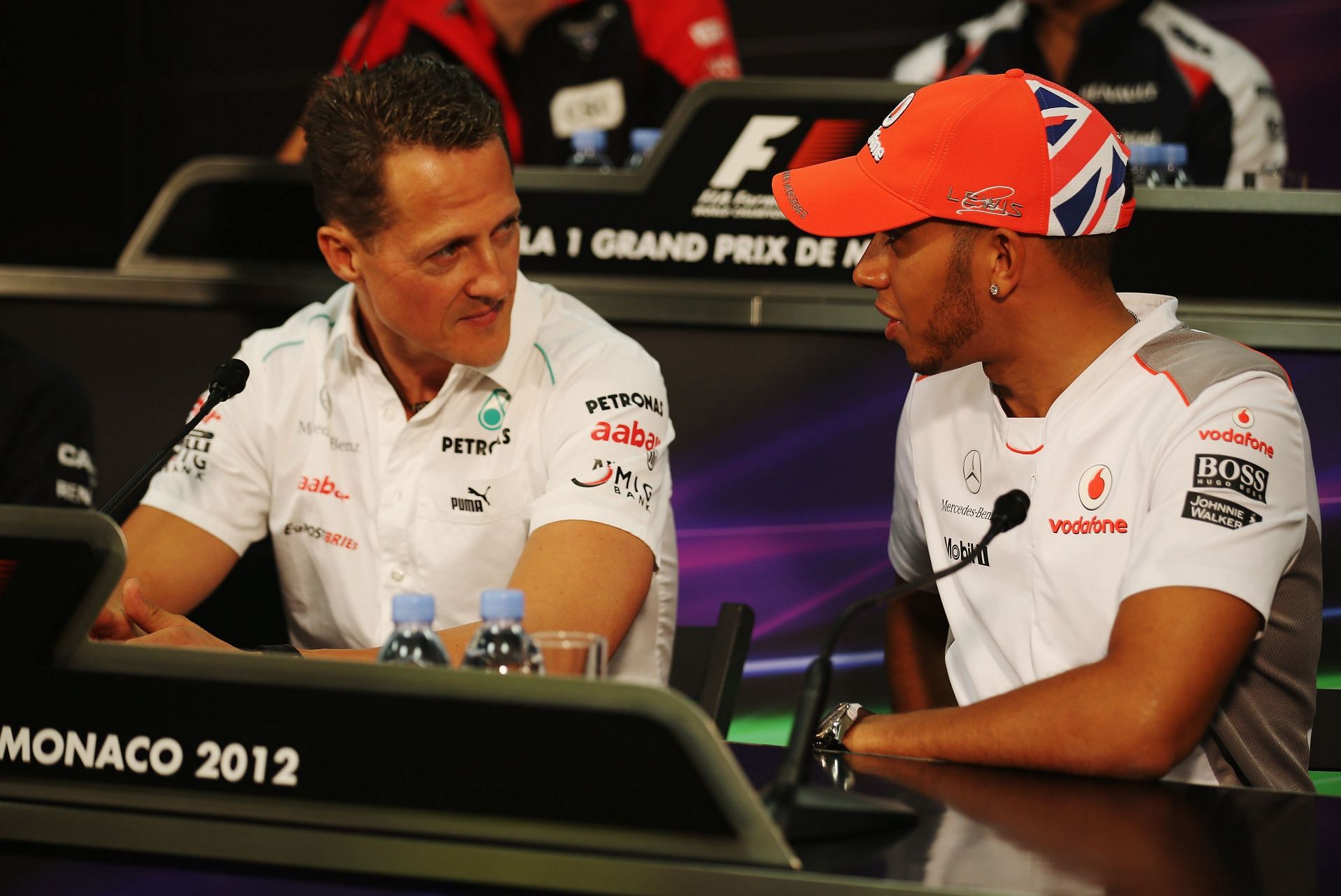 Michael Schumacher (left) and Lewis Hamilton (right) at the FIA press conference during the 2012 Monaco Grand Prix