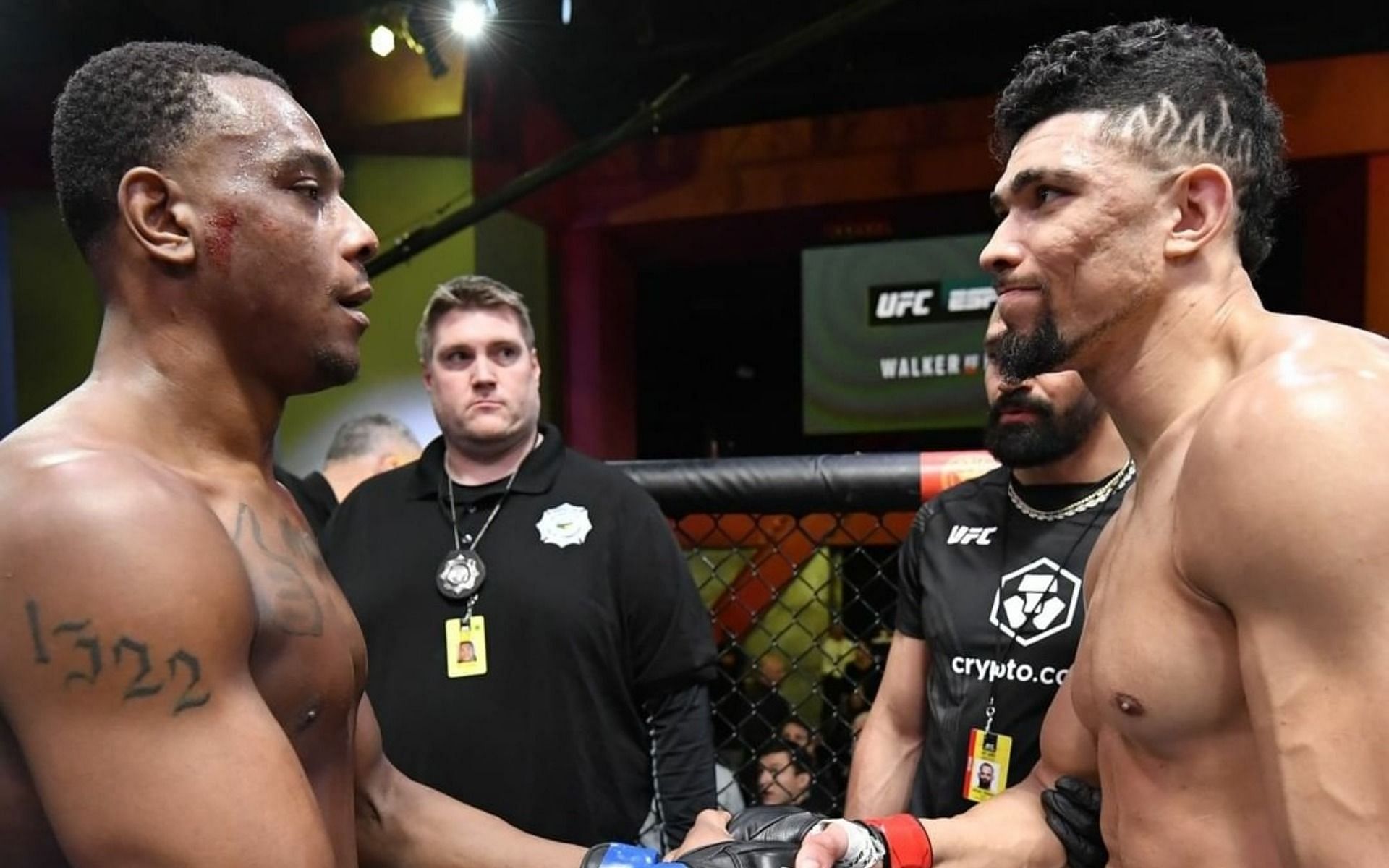 Jamahal Hill (left) and Johnny Walker (right) share a moment of mutual respect following their UFC Fight Night 201 clash [Image Credit: via @ufc on Instagram]