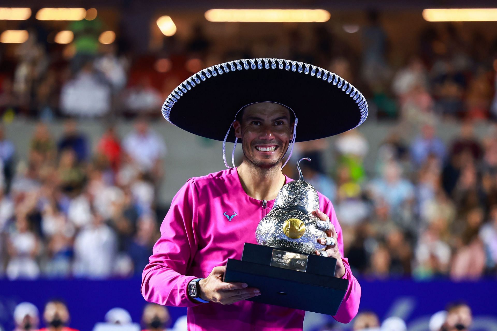 Rafael Nadal poses with the winner&#039;s trophy at the 2022 Abierto Mexicano Telcel.