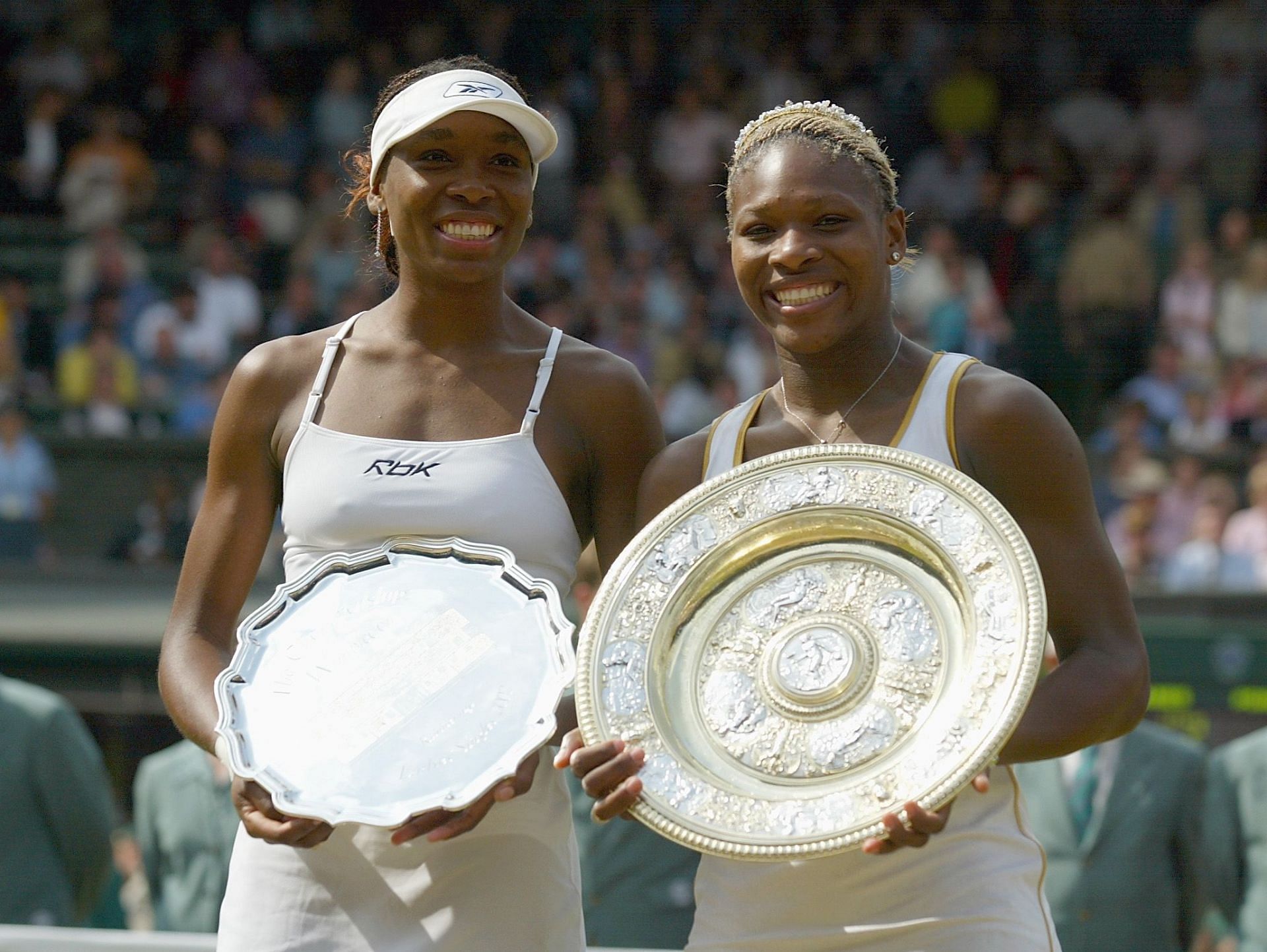 Venus Williams (L) and Serena Williams at the 2002 Wimbledon Championships