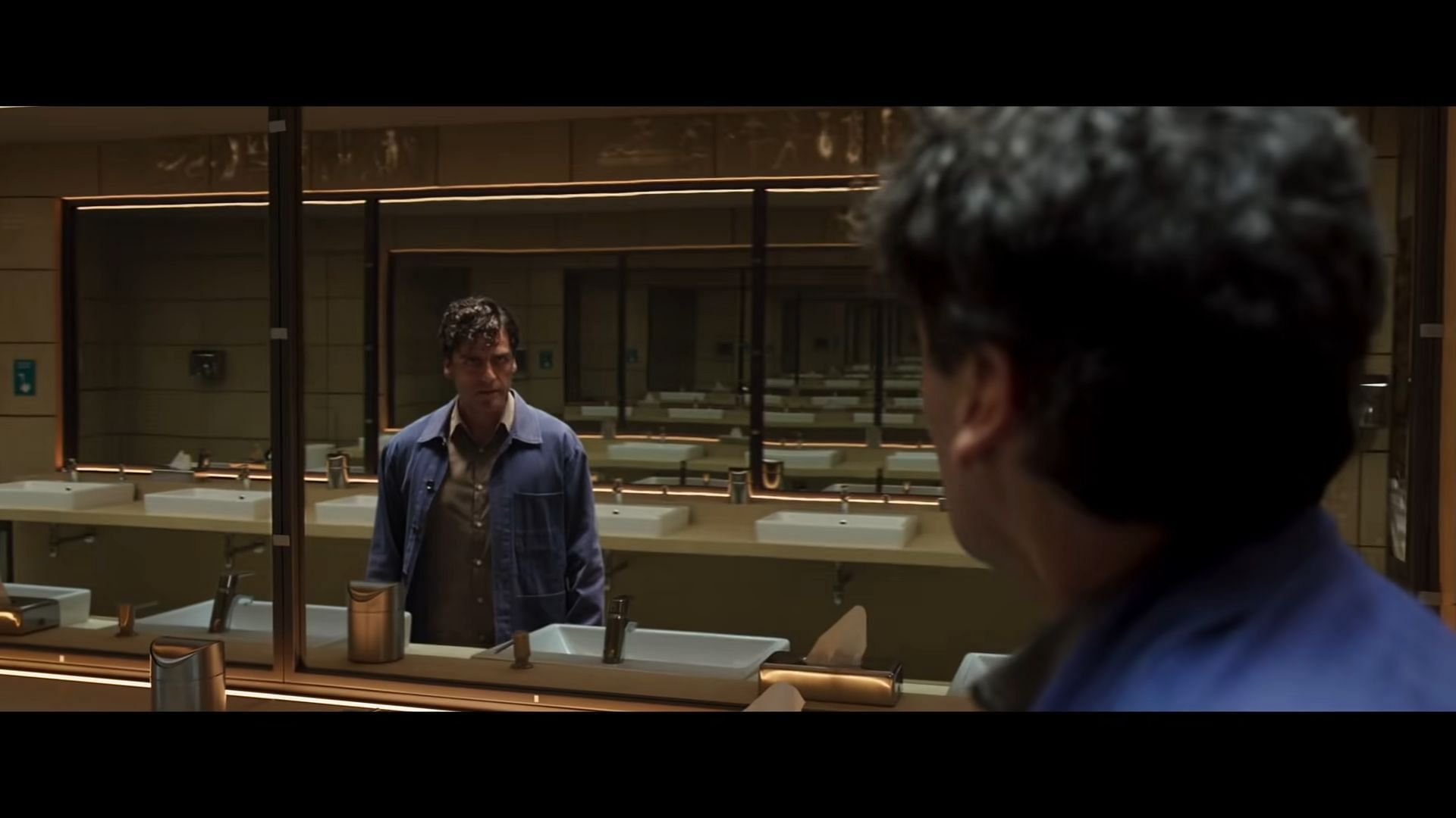 Marc Spector confronting Steven Grant through mirrors in the trailer (Image via Marvel Studios)