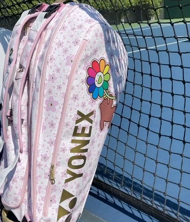 Her matching Yonex racket bag