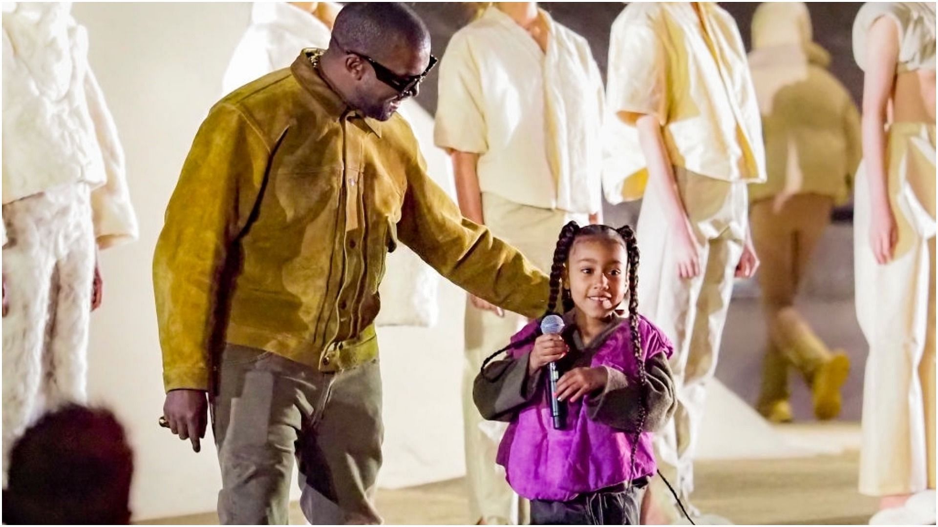 Kanye West and daughter North West attends the &quot;Yeezy Season 8&quot; show (Image via Arnold Jerocki/Getty Images)