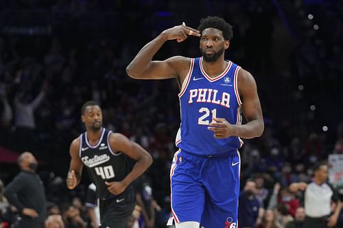 Joel Embiid #21 of the Philadelphia 76ers reacts in front of Harrison Barnes #40 of the Sacramento Kings in the second half at the Wells Fargo Center on January 29, 2022 in Philadelphia, Pennsylvania. The 76ers defeated the Kings 103-101.