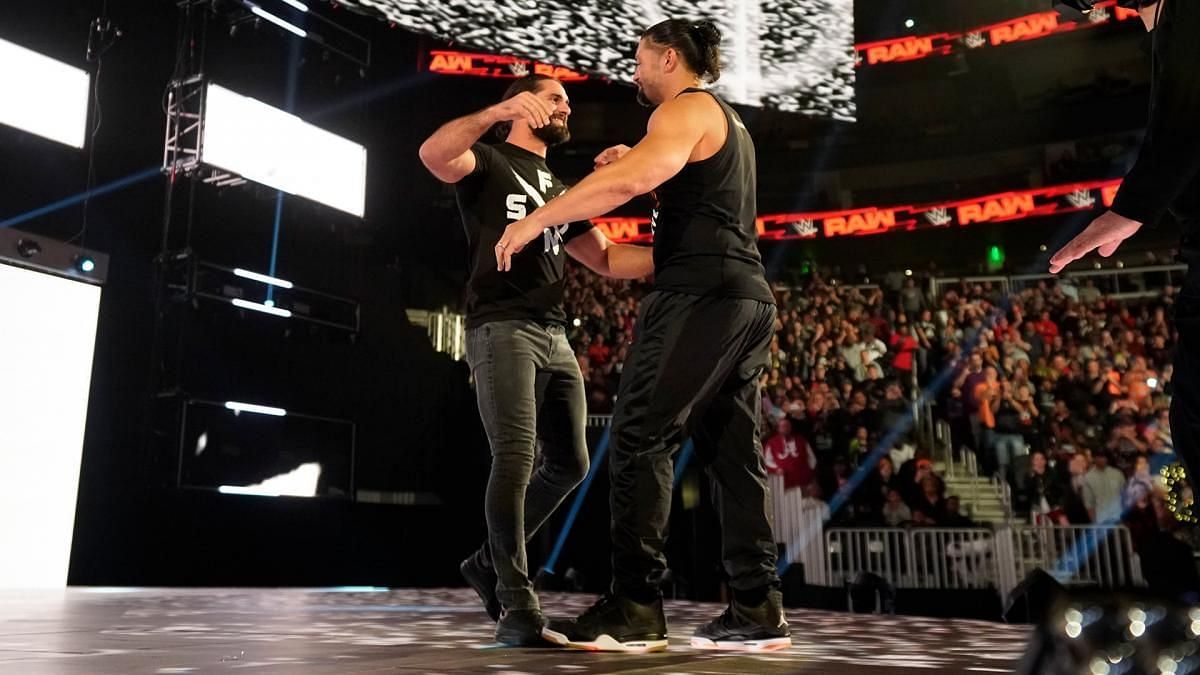 Seth Rollins embraces Roman Reigns after his return from battling Leukemia