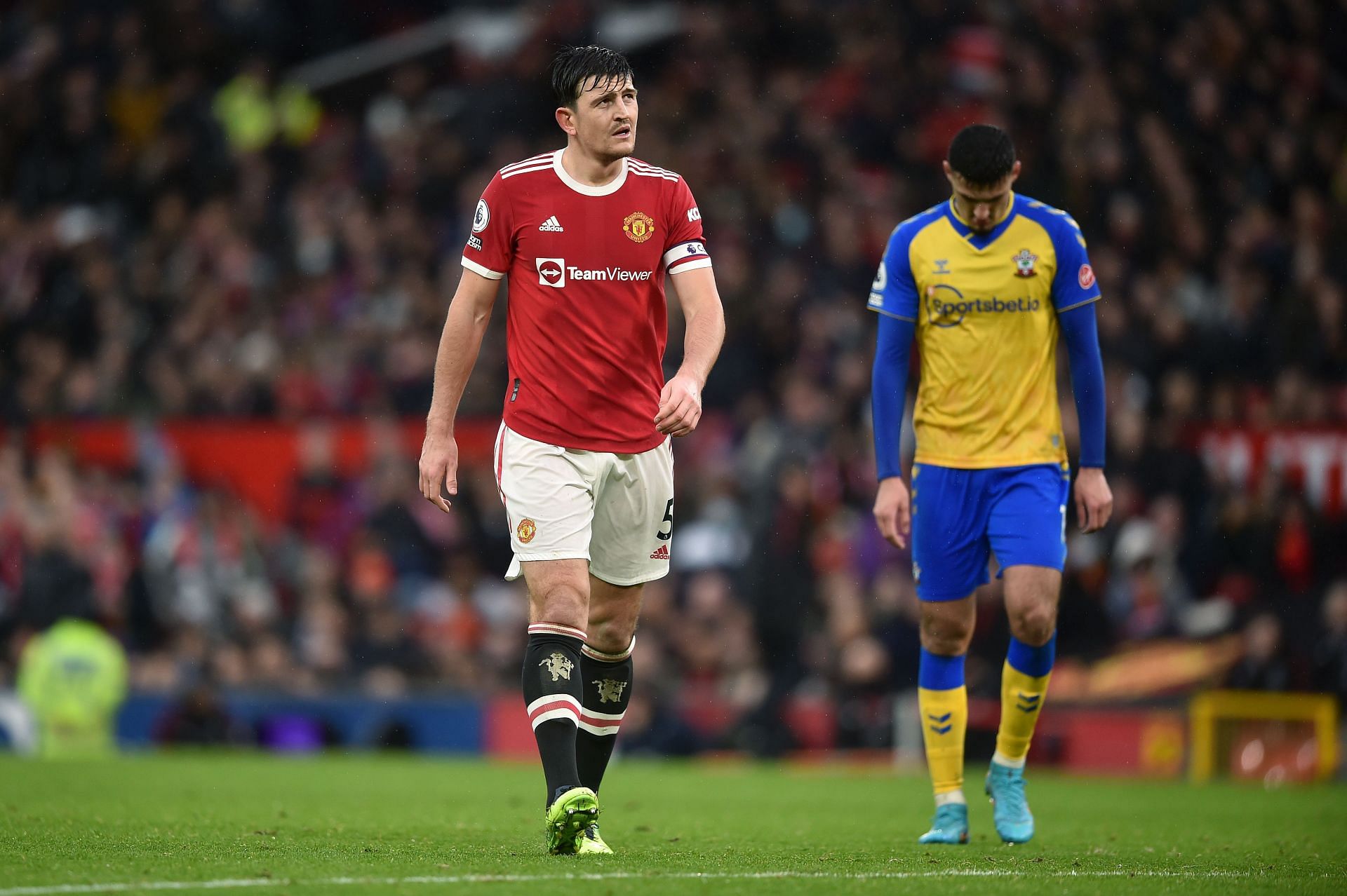Michael Owen believes Harry Maguire (left) &rsquo;s lack of pace has become a problem for Manchester United.