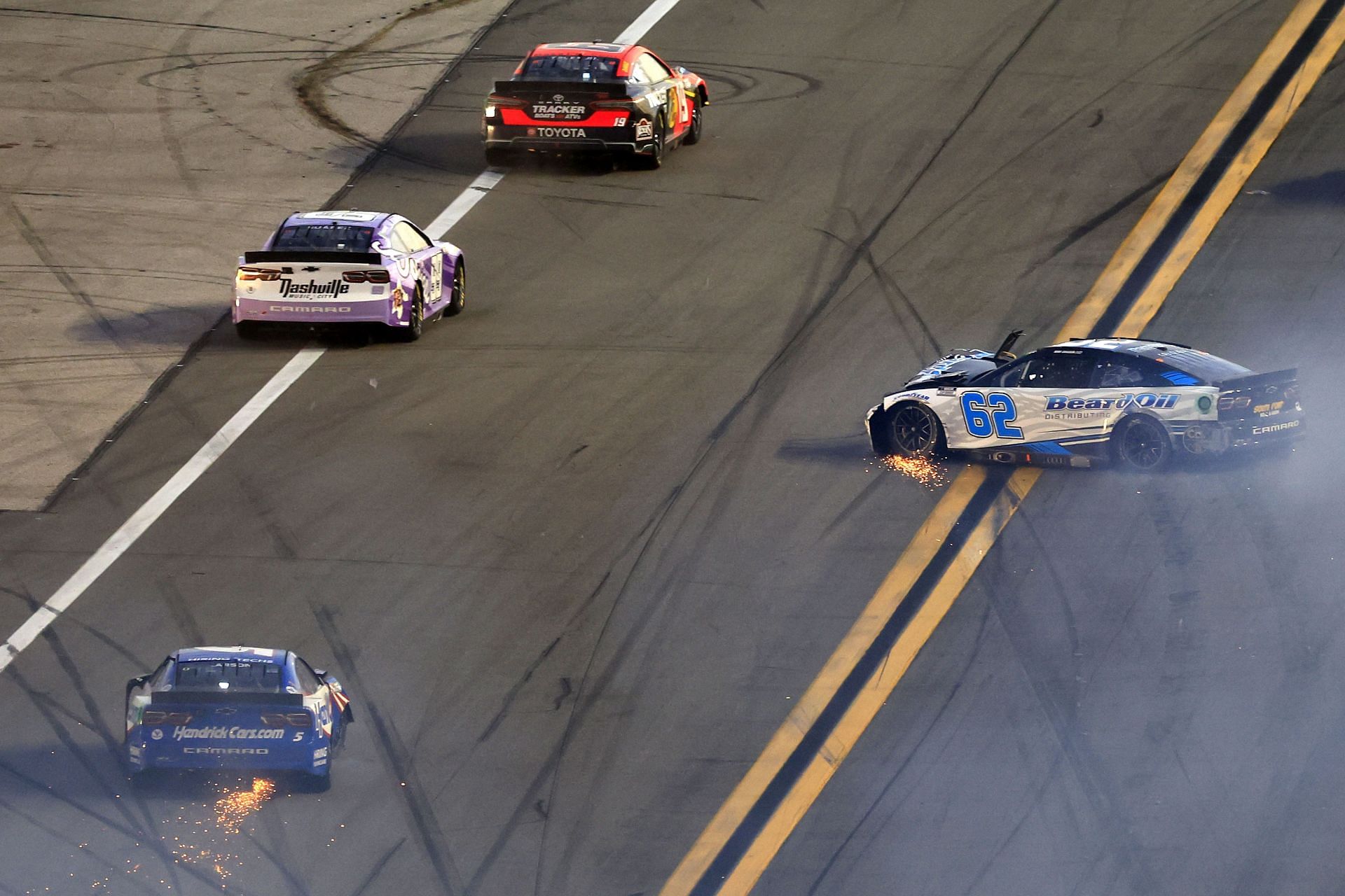 Next Gen cars spin with sparks an on-track incident during the 64th annual Daytona 500